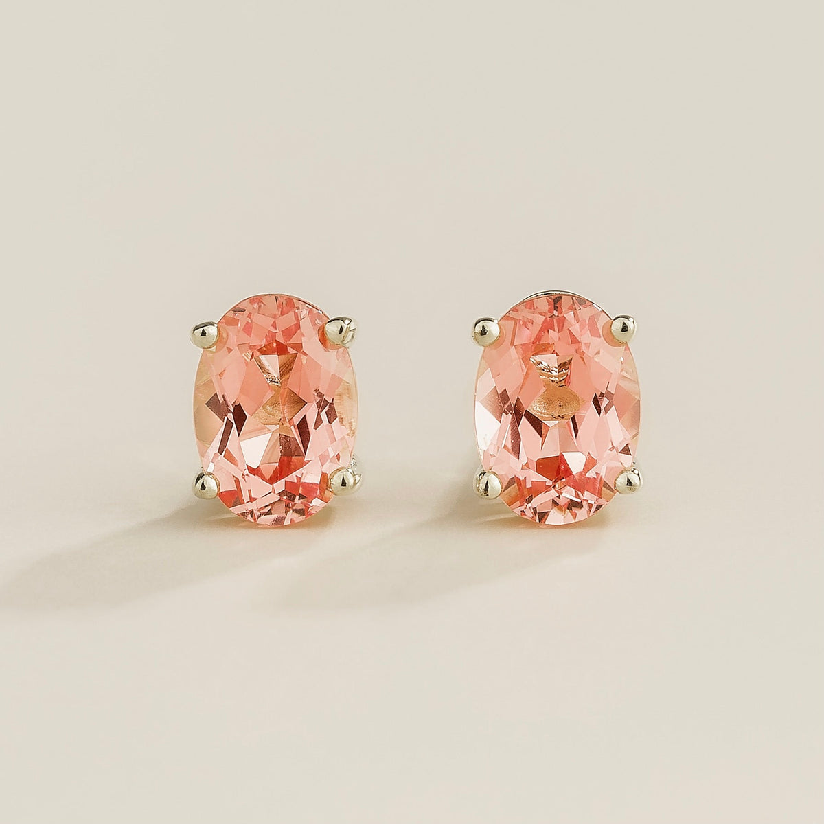 Ovo Padparadscha Sapphire Oval Solitaire Stud Earrings in White Gold