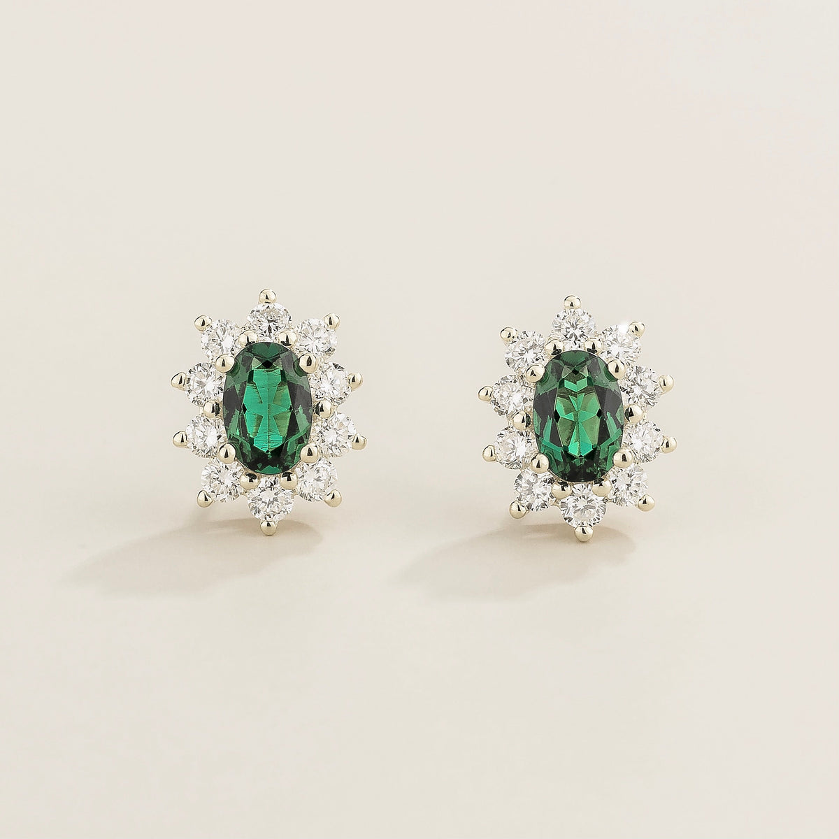 Oda Oval Emerald & Diamond Halo Stud Earrings in White Gold