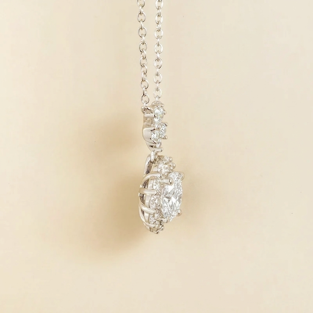 Round lab-grown diamond and diamond halo pendant necklace with flower bail in white gold | Juvetti London