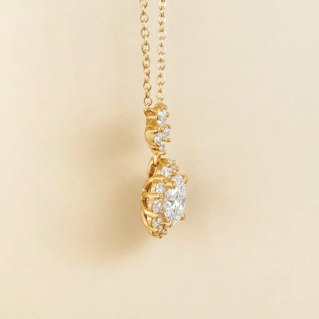 Round lab-grown diamond and diamond halo pendant necklace with flower bail in gold | Juvetti London