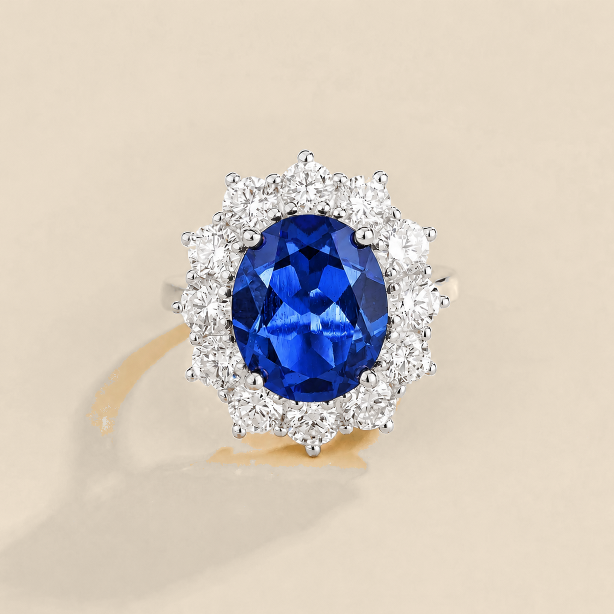 Divo Blue Sapphire Oval & Diamond Halo Ring | Juvetti