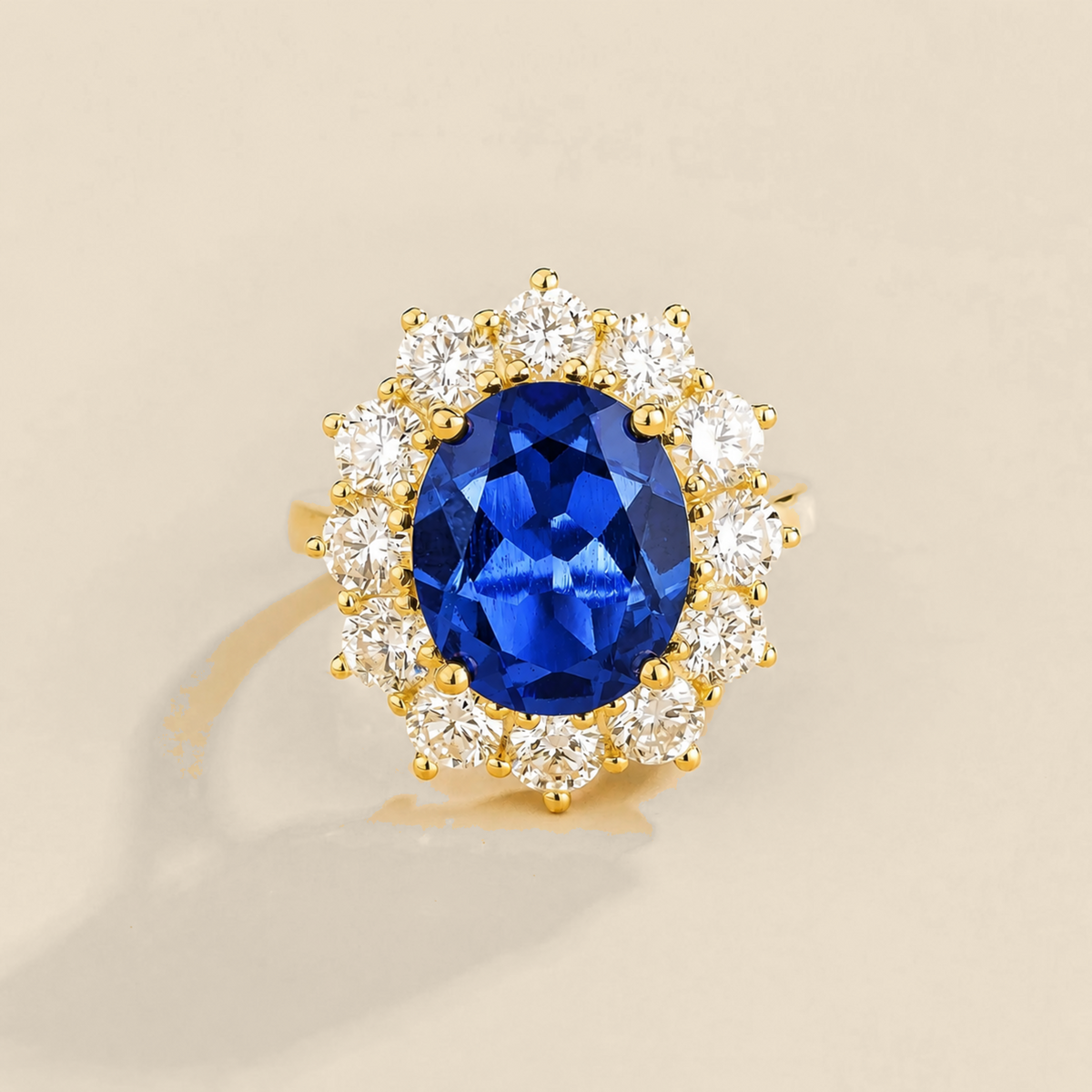 Oda Oval Blue Sapphire Cocktail Ring, Diamond Halo, Gold | Juvetti