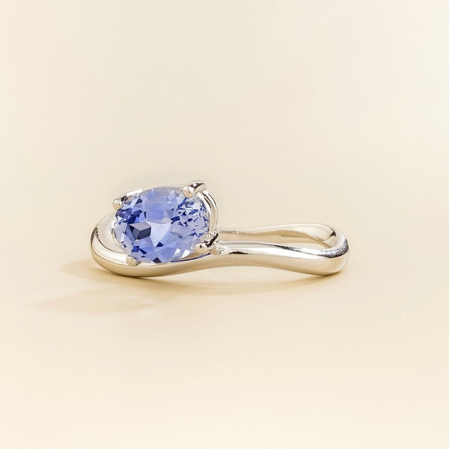 Luno Pastel Blue Sapphire Oval Solitaire Curved Band Ring in White Gold
