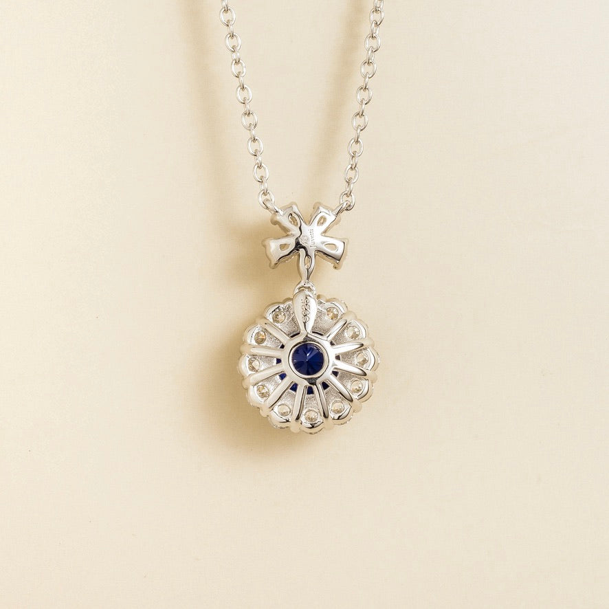 Round Blue Sapphire Halo Pendant Necklace with Flower Bail in White Gold