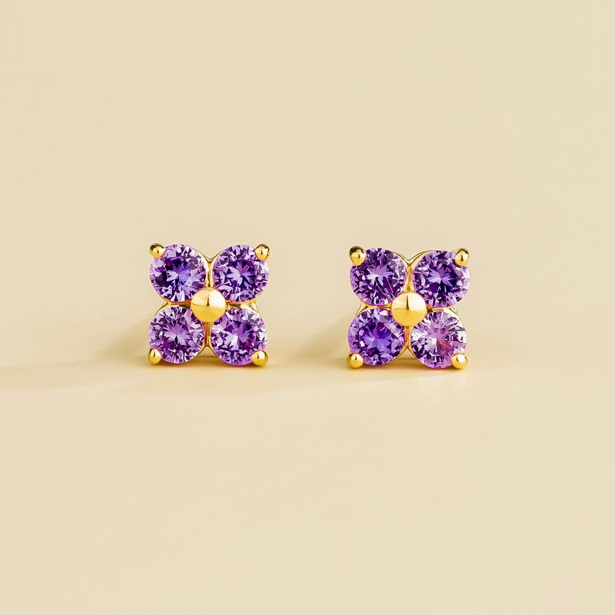 Four-leaf clover lab-grown purple sapphire stud earrings in gold | Juvetti London