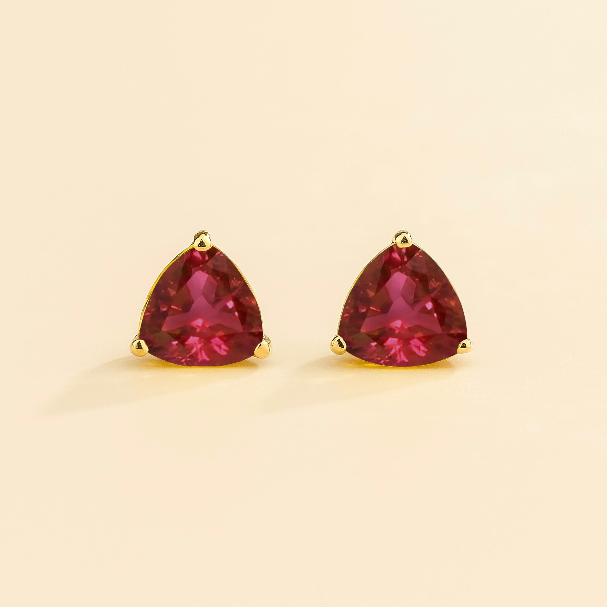 Trillion Ruby Solitaire Stud Earrings in Gold