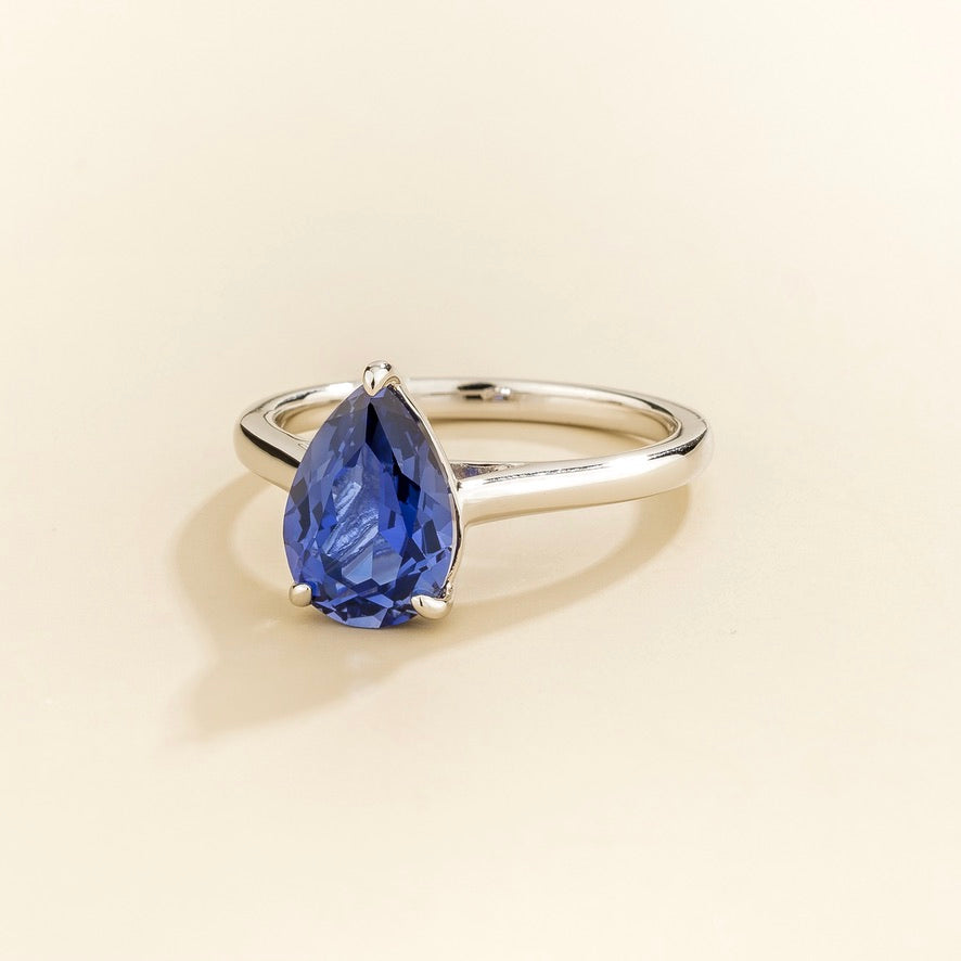 Pandal Pear Shape Blue Sapphire Cathedral Solitaire Ring