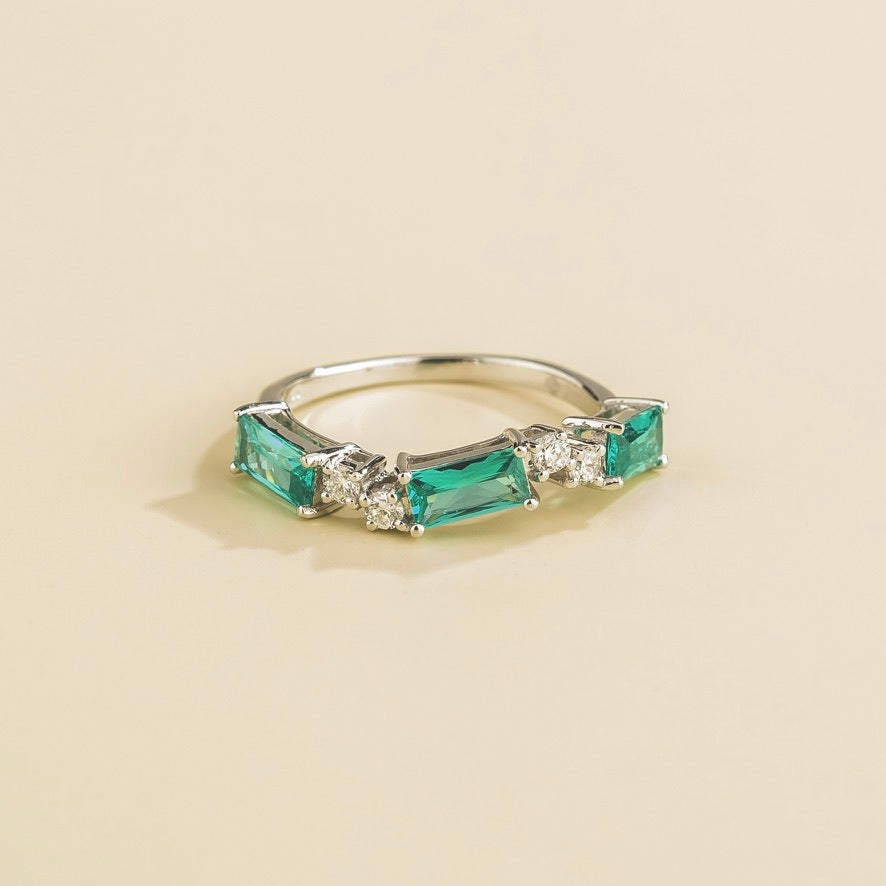 Baguette-cut lab-grown Paraiba sapphire and diamond three-stone Forma ring in white gold | Juvetti London