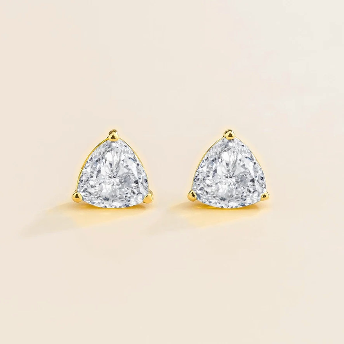 Trillion diamond solitaire stud earrings in gold