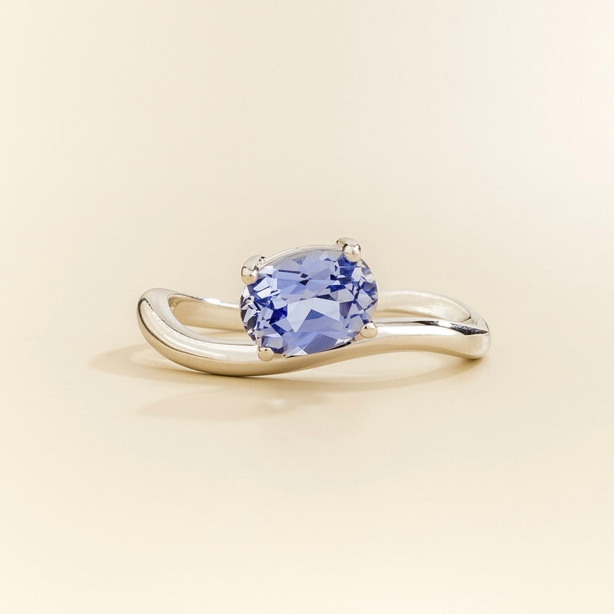 Luno Pastel Blue Sapphire Oval Solitaire Curved Band Ring in White Gold