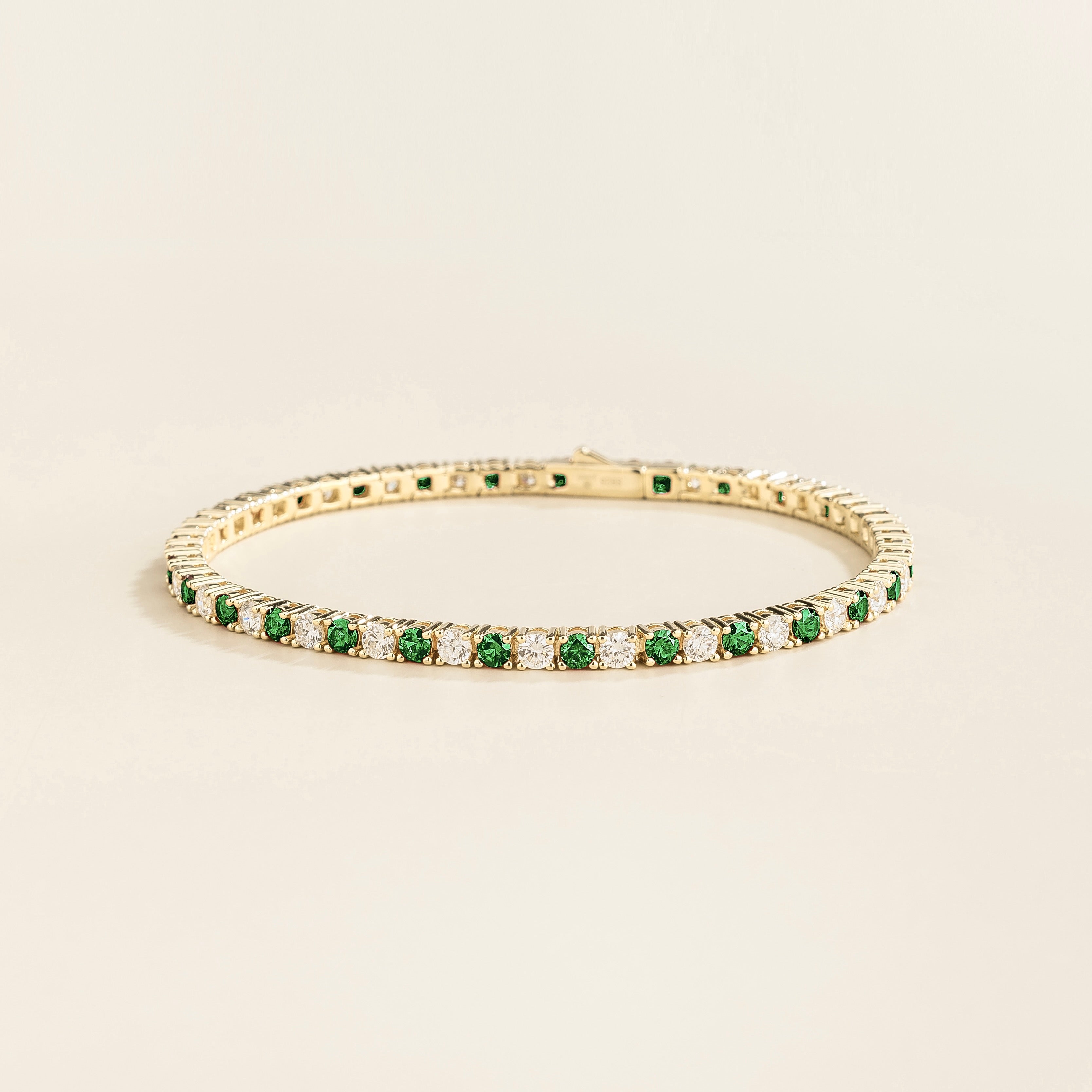 Ciclo Emerald & Diamond Round Tennis Bracelet in White Gold