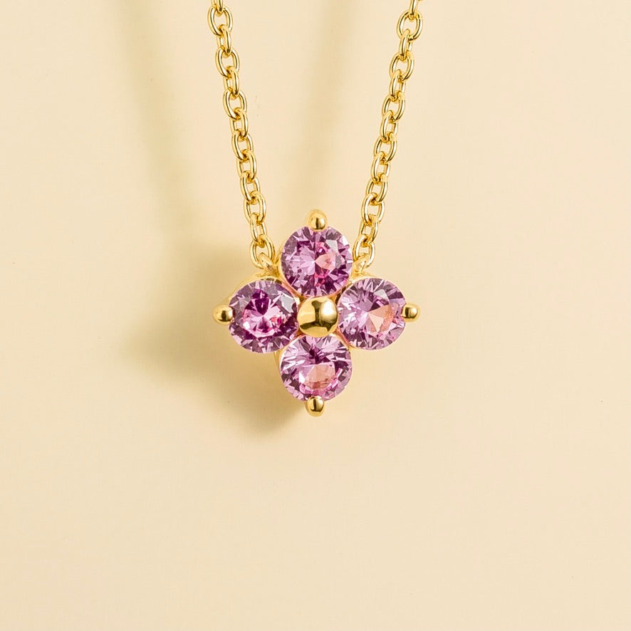 Four-leaf clover lab-grown pink sapphire necklace in gold | Juvetti London