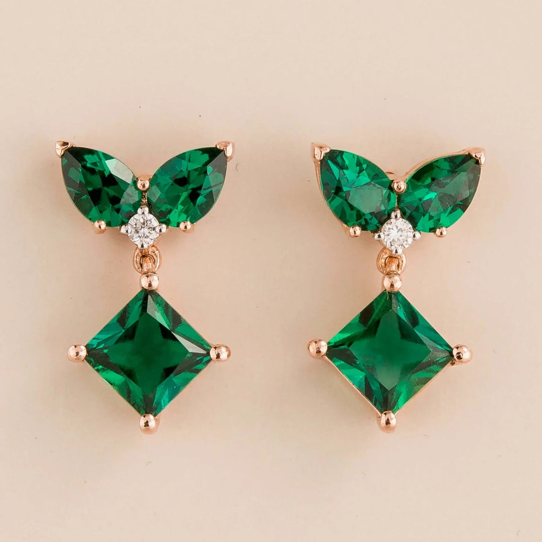 Amore earrings in 18k pink gold vermeil set with lab grown diamond and emerald. Perfect for yourself and as gift.