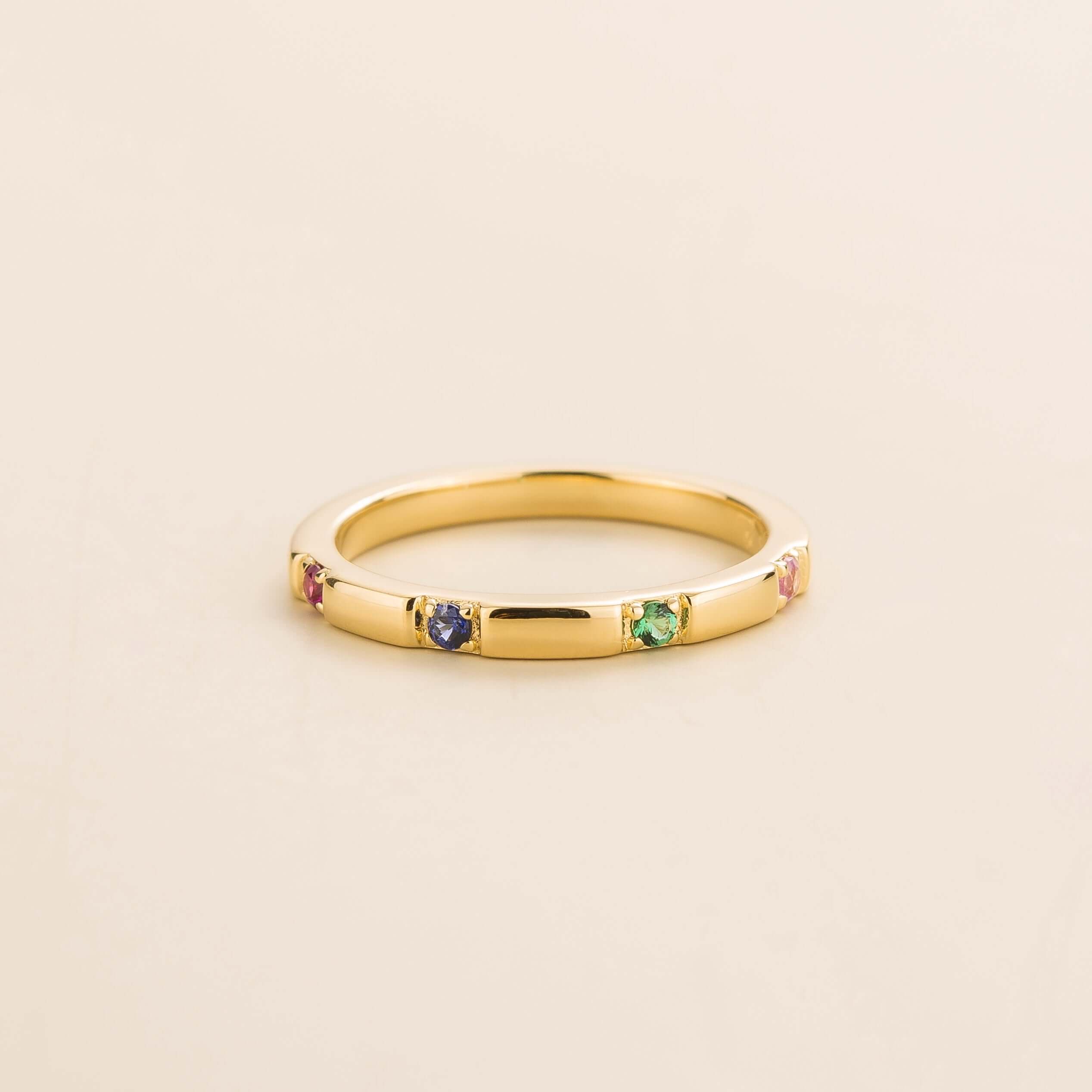 Balans Ruby, Blue Sapphire, Emerald & Pink Sapphire Station Band Ring in White Gold
