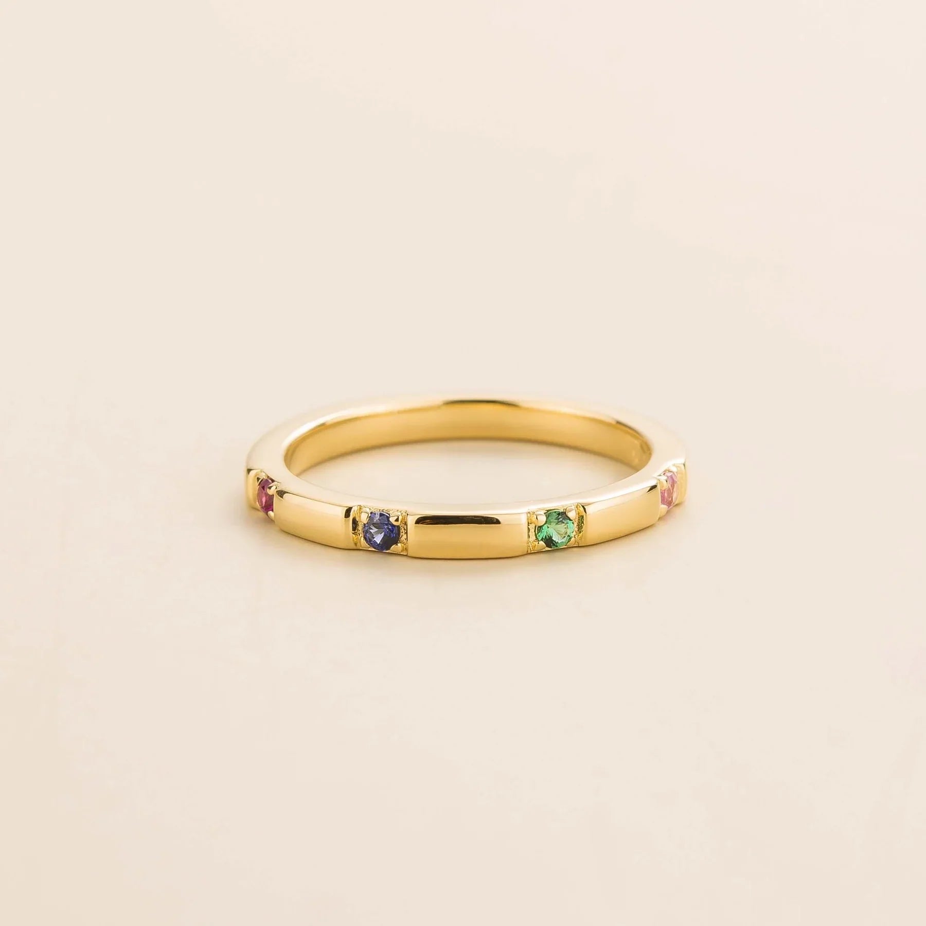 Balans Ruby, Blue Sapphire, Emerald & Pink Sapphire Station Band Ring in White Gold