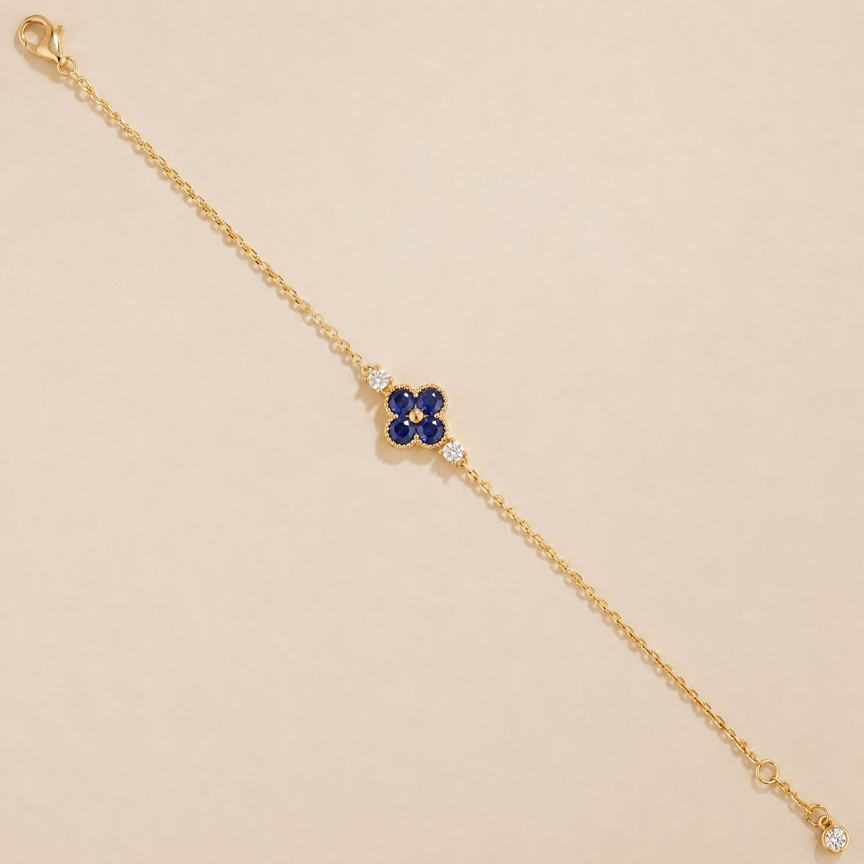 Blue Sapphire and Diamond Four-Leaf Clover Chain Bracelet in Gold