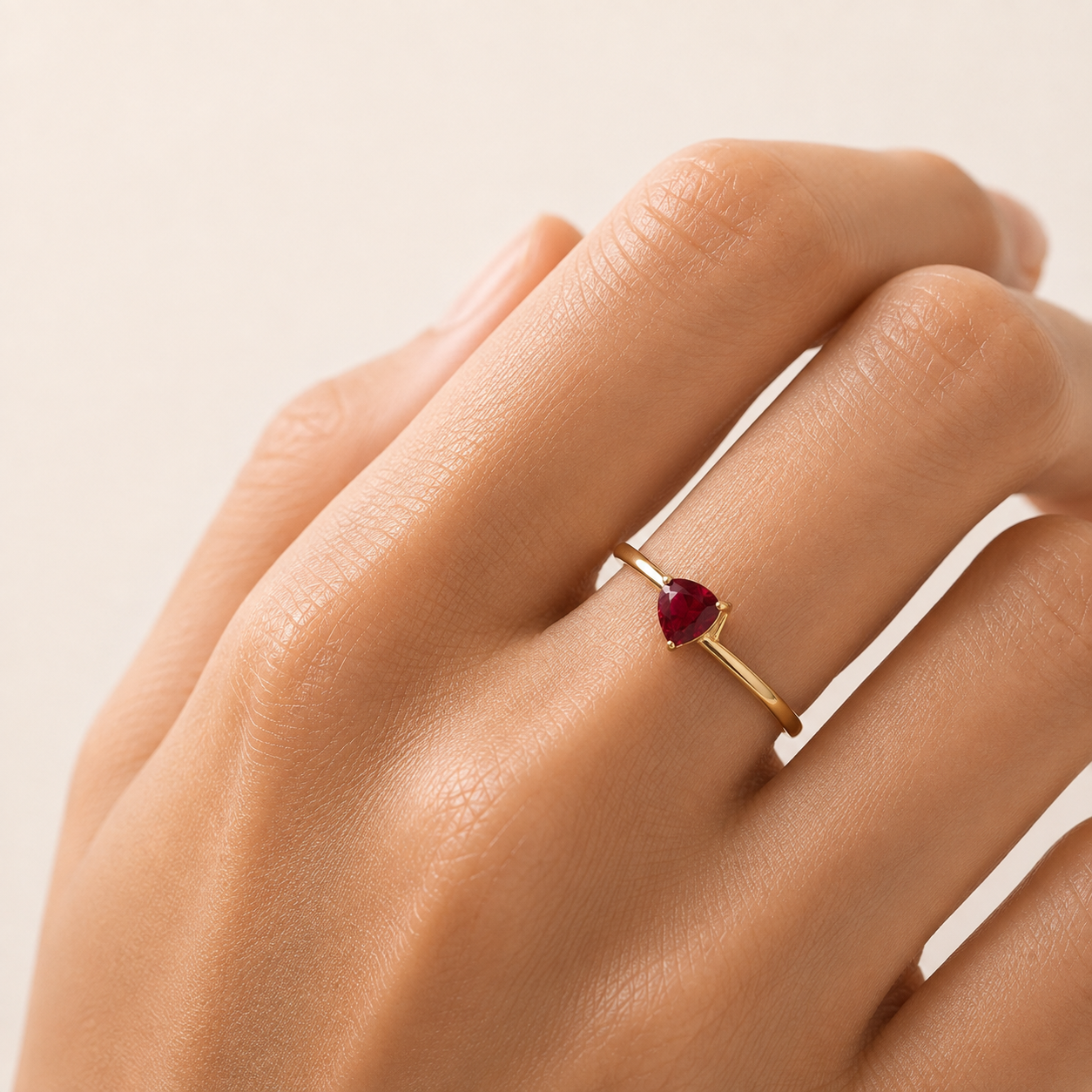 Trillion Ruby Solitaire Ring in Gold