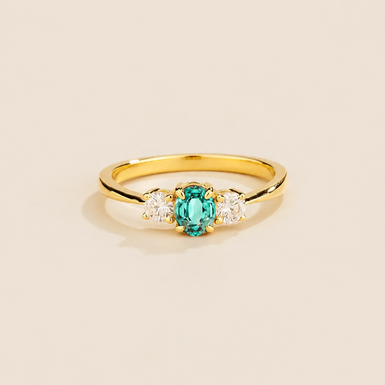 Boble Paraiba Oval & Diamond Three-Stone Ring in Gold – Front view