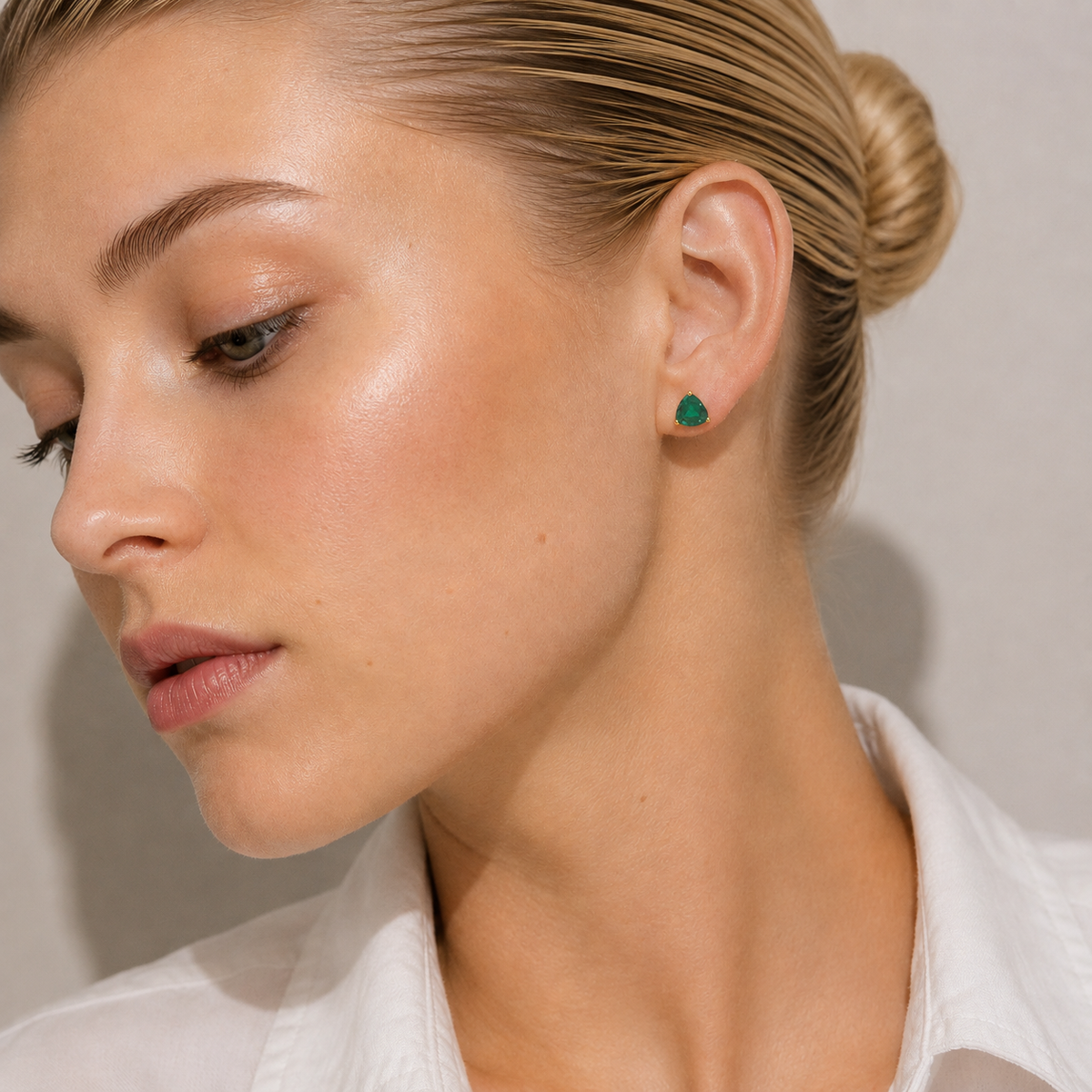 Trillion Emerald Solitaire Stud Earrings in Gold
