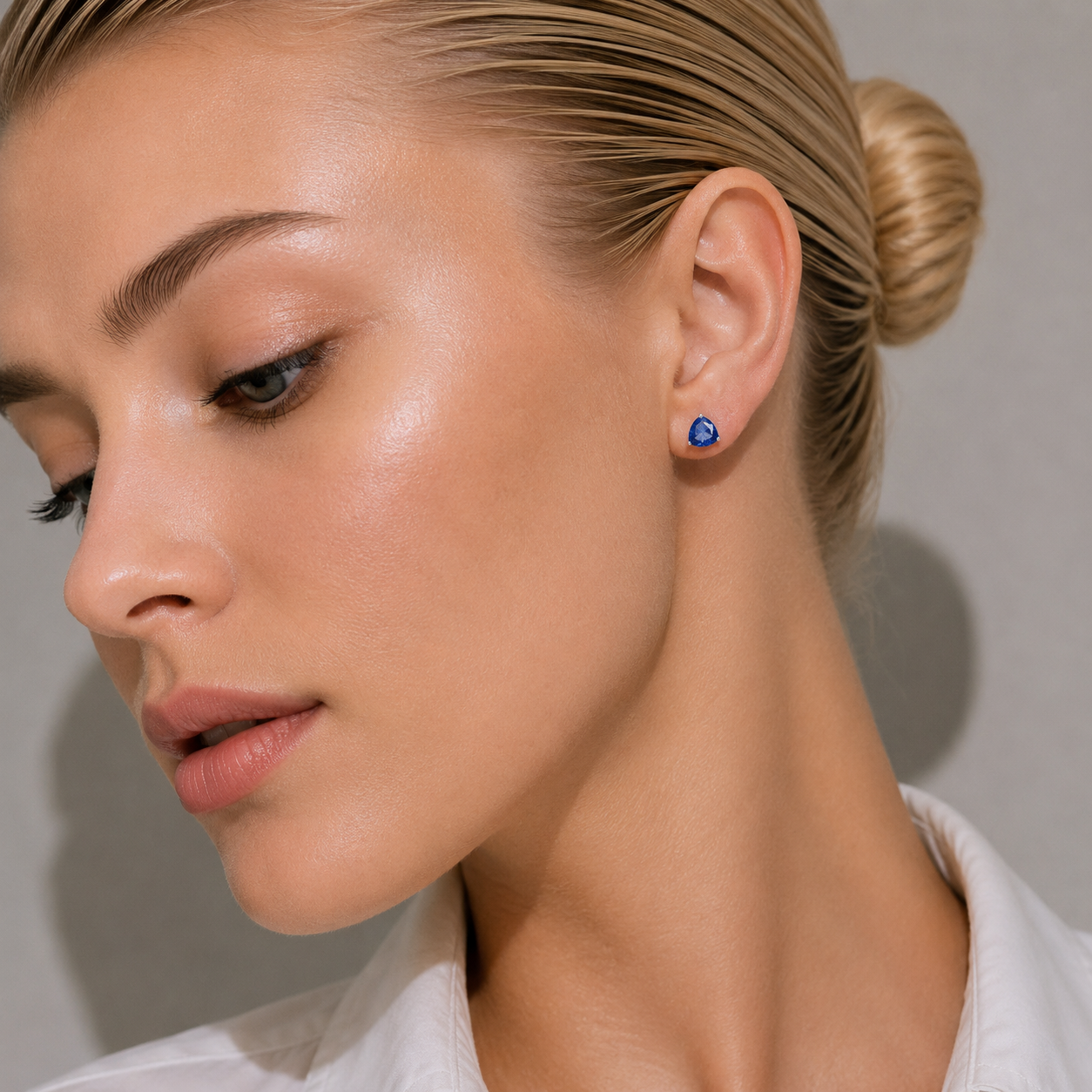 Trillion Blue Sapphire Solitaire Stud Earrings in White Gold