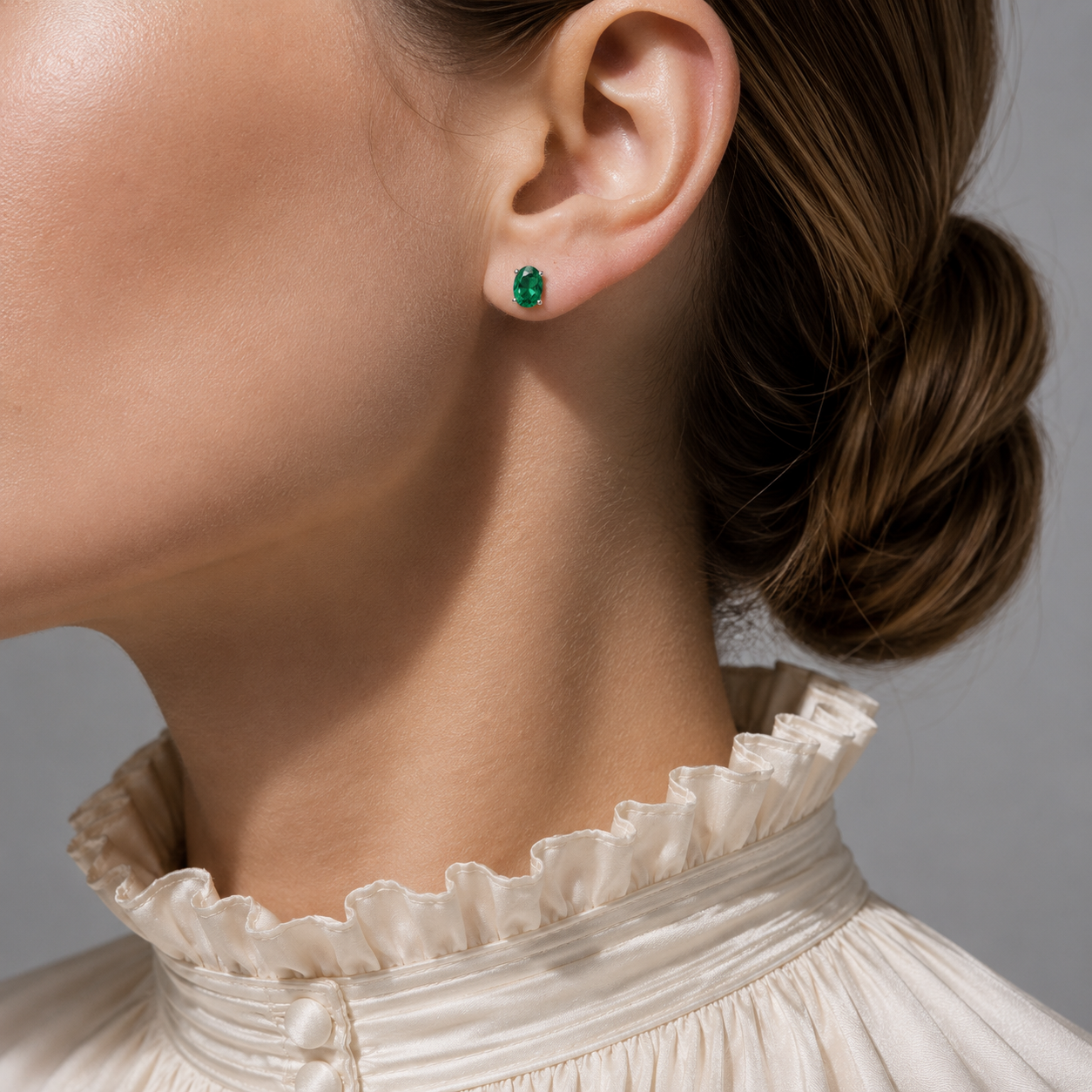 Ovo Emerald Oval Solitaire Stud Earrings in White Gold