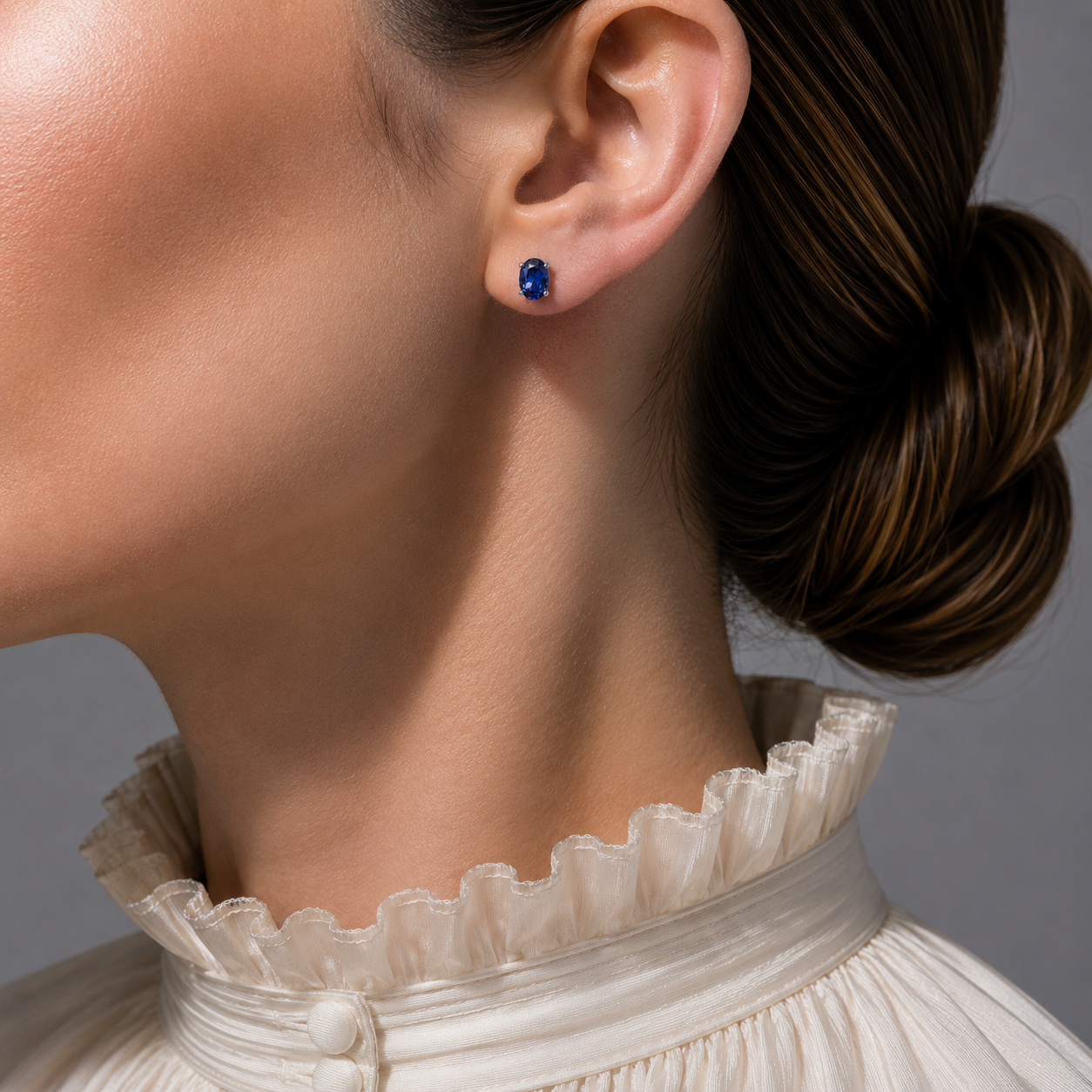 Ovo Blue Sapphire Oval Solitaire Stud Earrings in White Gold