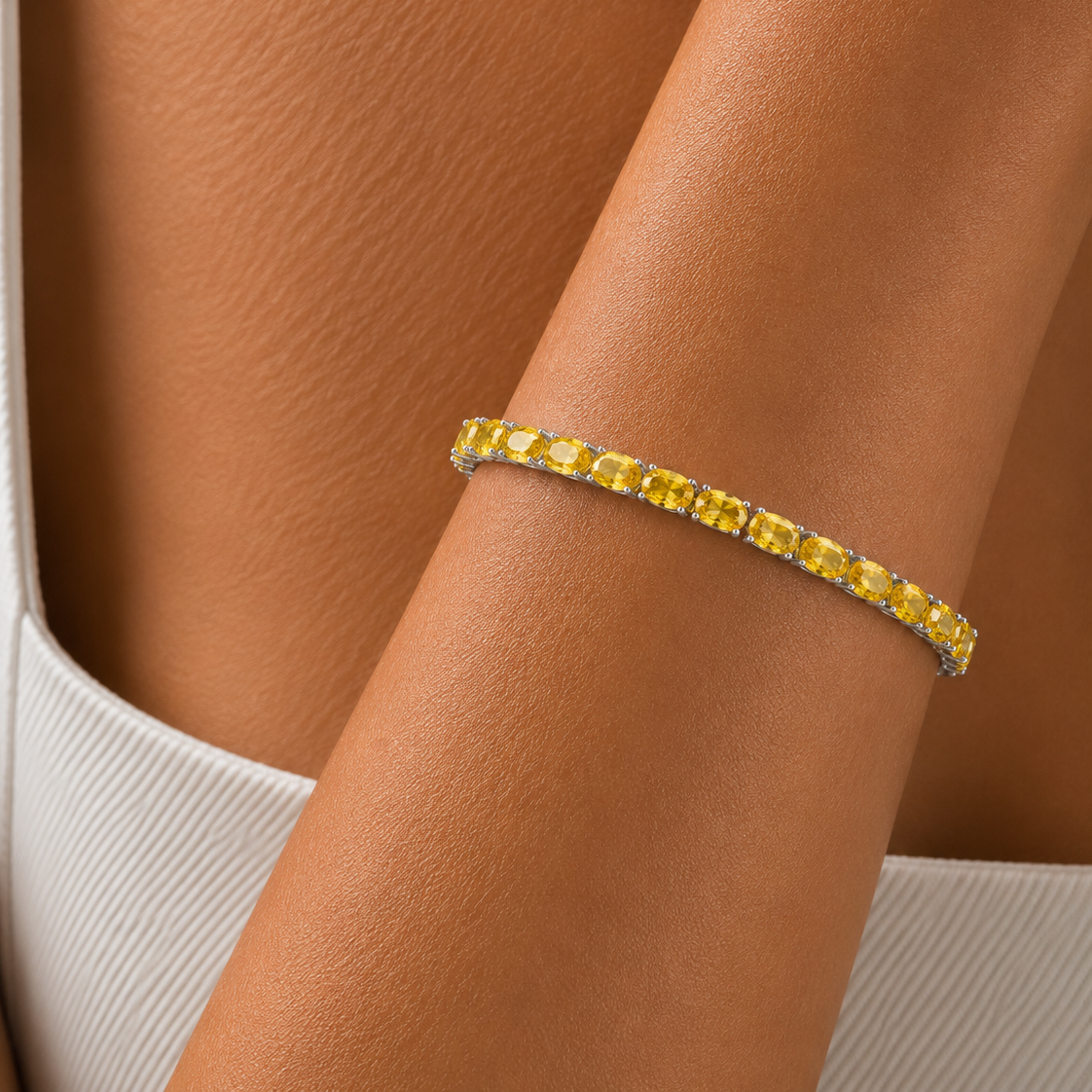 Salto Yellow Sapphire Oval Tennis Bracelet in White Gold