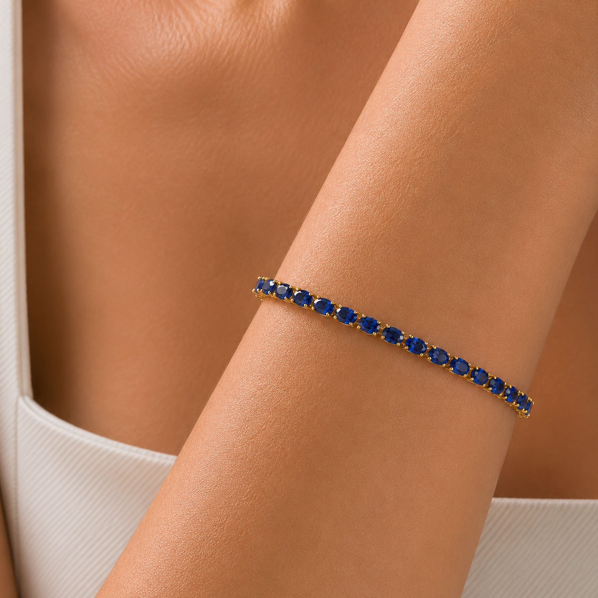Salto Blue Sapphire Oval Tennis Bracelet in Gold