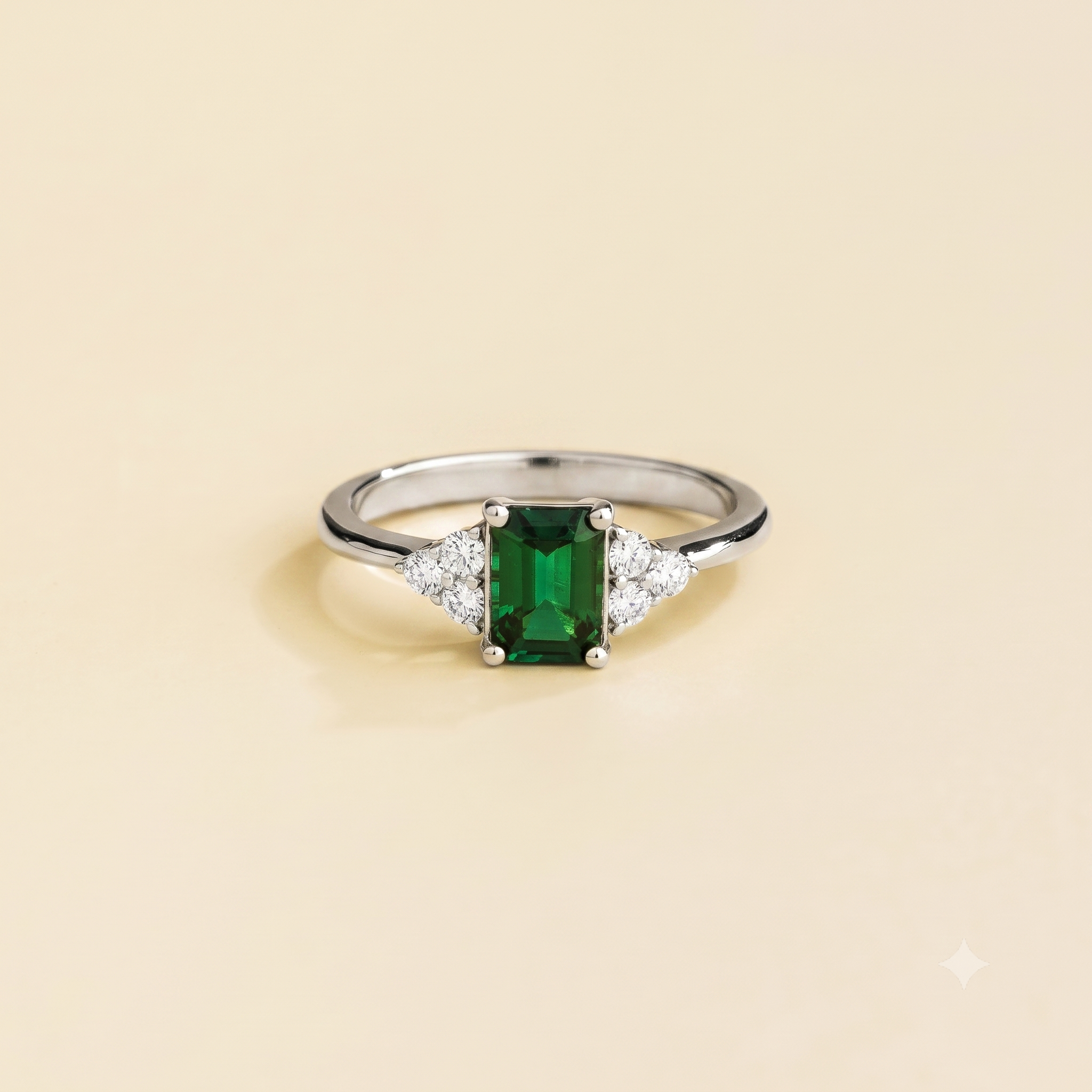 Emerald-cut lab-grown emerald and diamond Chateau ring in white gold | Juvetti London