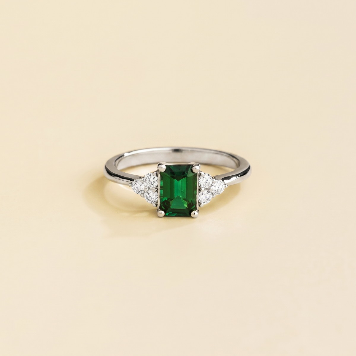 Emerald-cut lab-grown emerald and diamond Chateau ring in white gold | Juvetti London