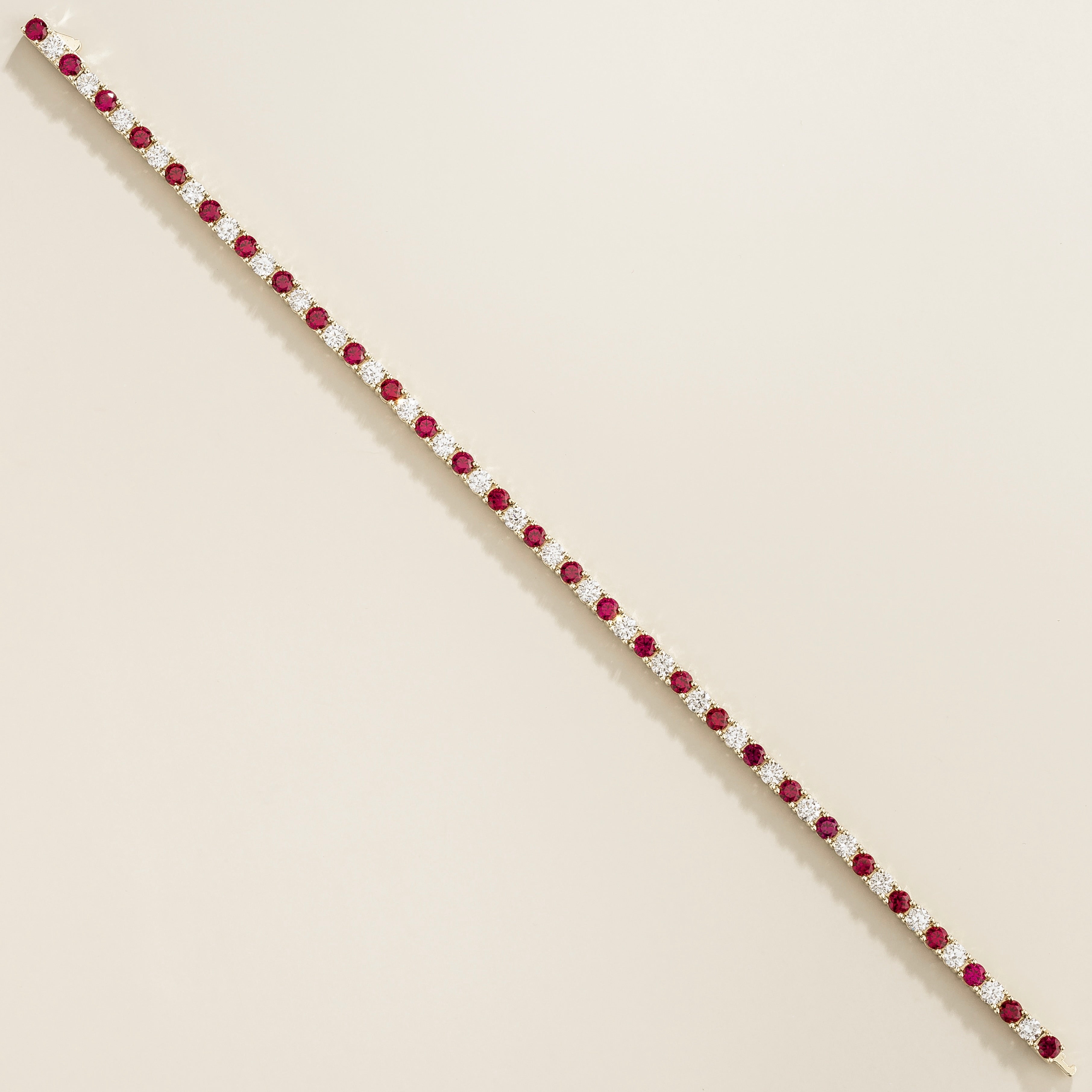 Ciclo Ruby & Diamond Round Tennis Bracelet in White Gold