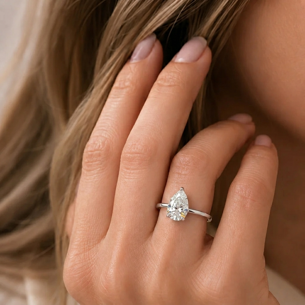 Pandal Pear Shape Diamond Cathedral Solitaire Ring in White Gold