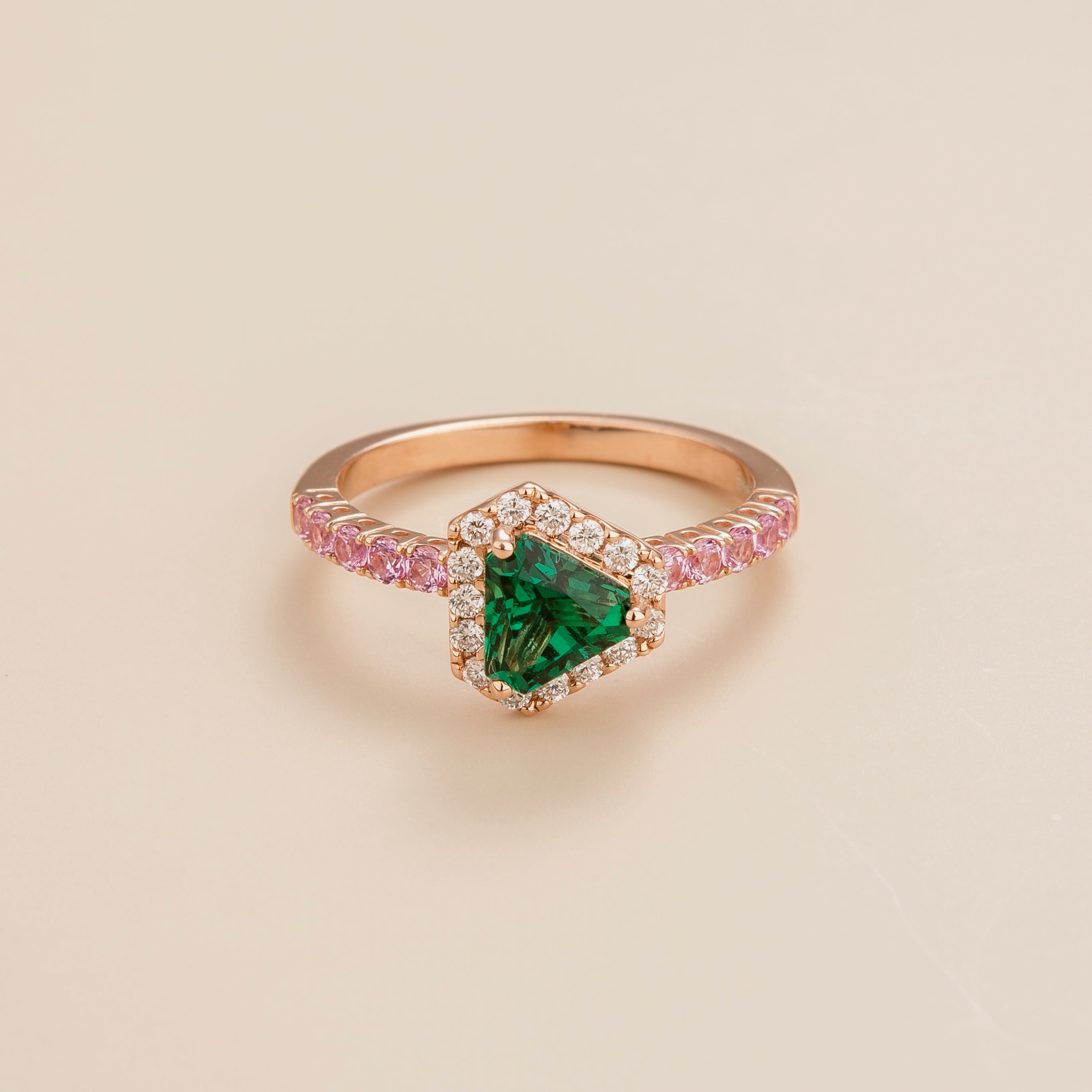 Diana ring in 18K pink gold vermeil set with lab grown diamond, emerald and pink sapphire gem stones.