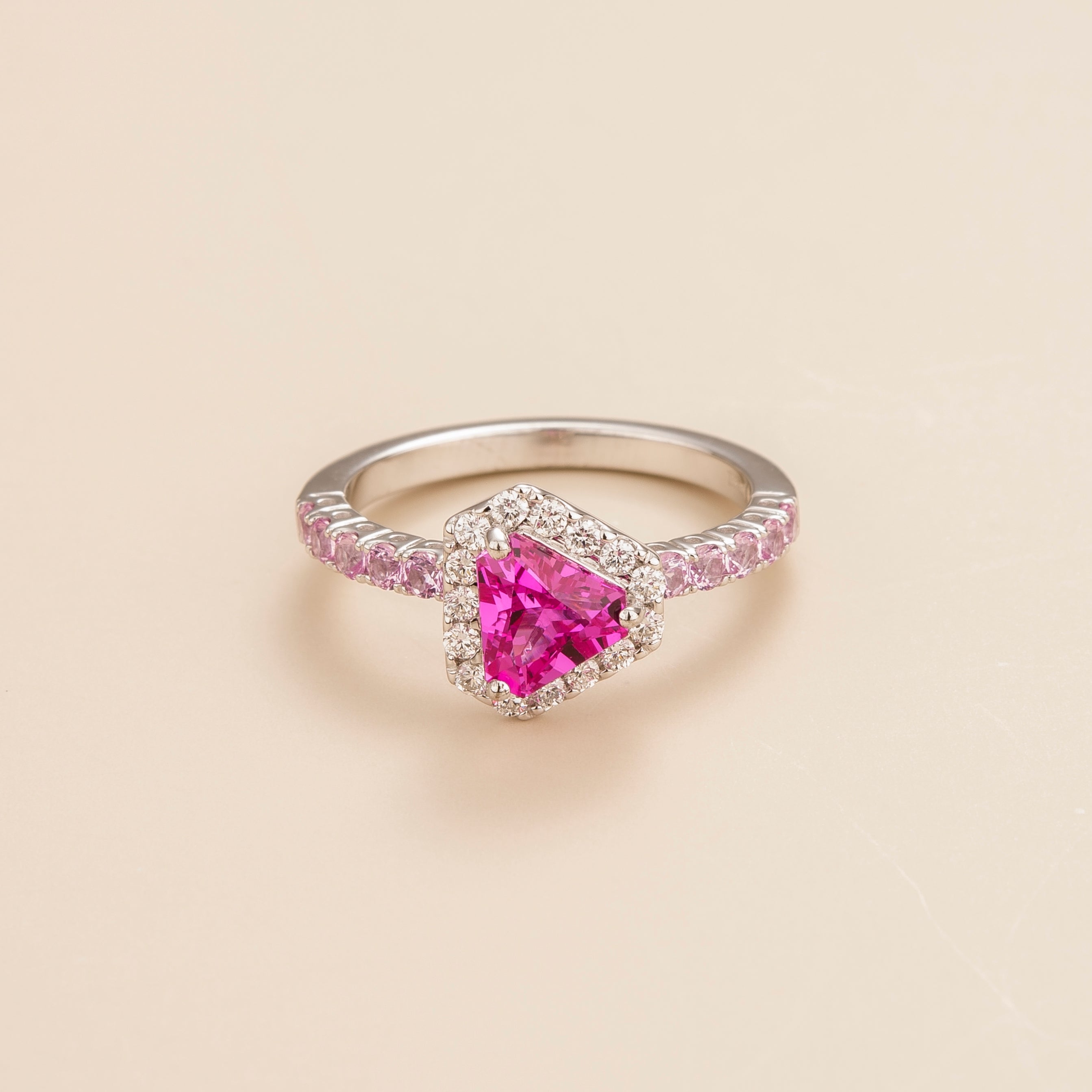 Diana ring in 18K white gold vermeil set with lab grown diamond and triangle pink sapphire gem stones. Perfect for yourself and as gift.