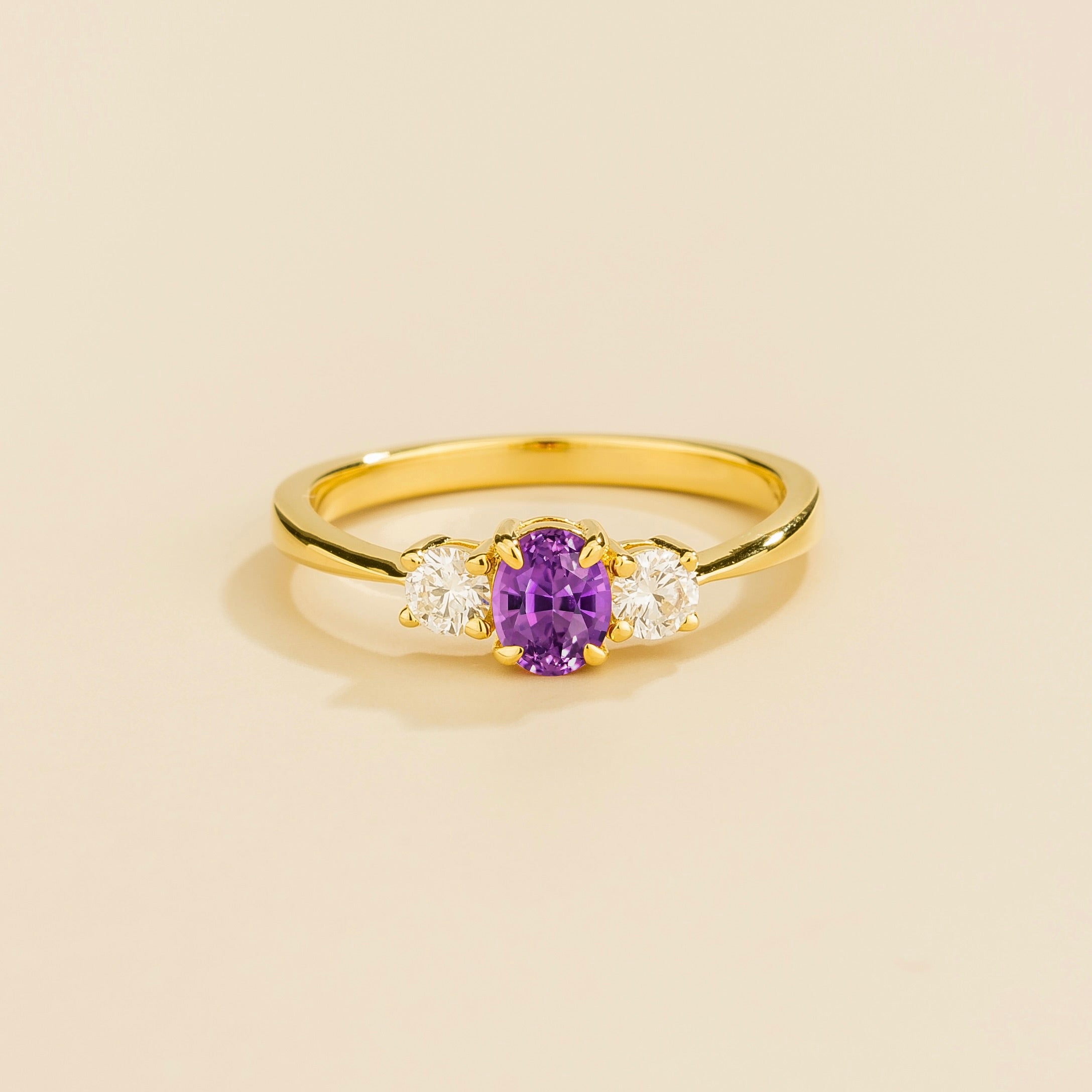 Oval lab-grown purple sapphire and diamond three-stone Boble ring in gold | Juvetti London