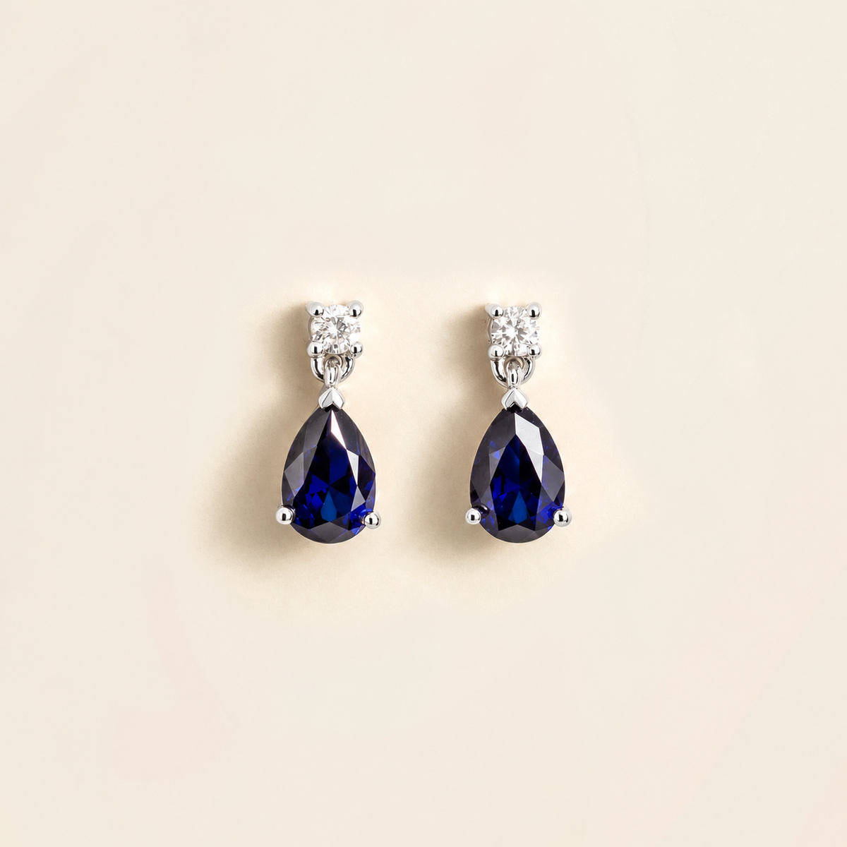 Pisa Blue Sapphire & Diamond Pear Drop Earrings in White Gold