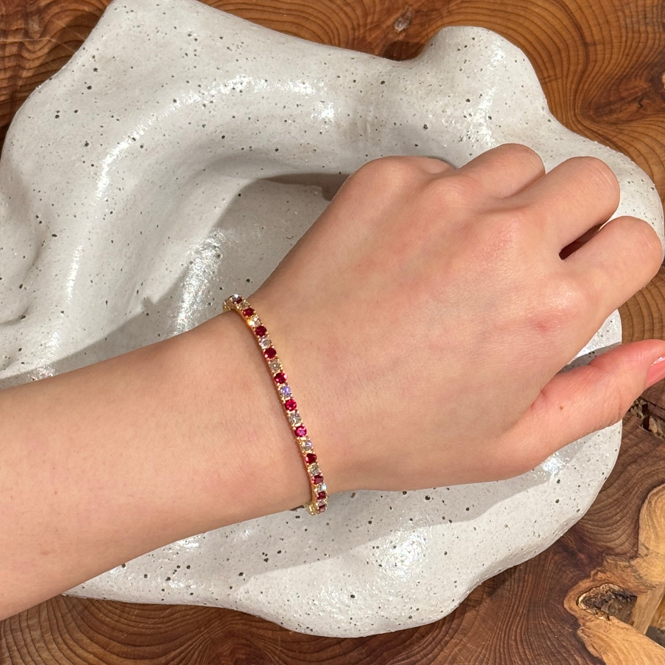 elegant gold tennis bracelet with ruby and lab grown diamonds for women