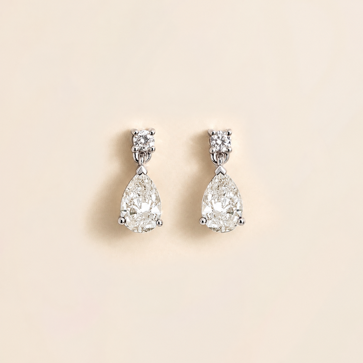 Pisa diamond pear drop earrings in white gold
