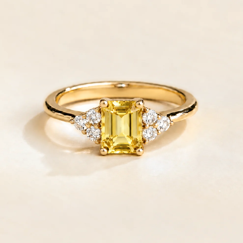 Chateau yellow sapphire emerald-cut & diamond ring in gold