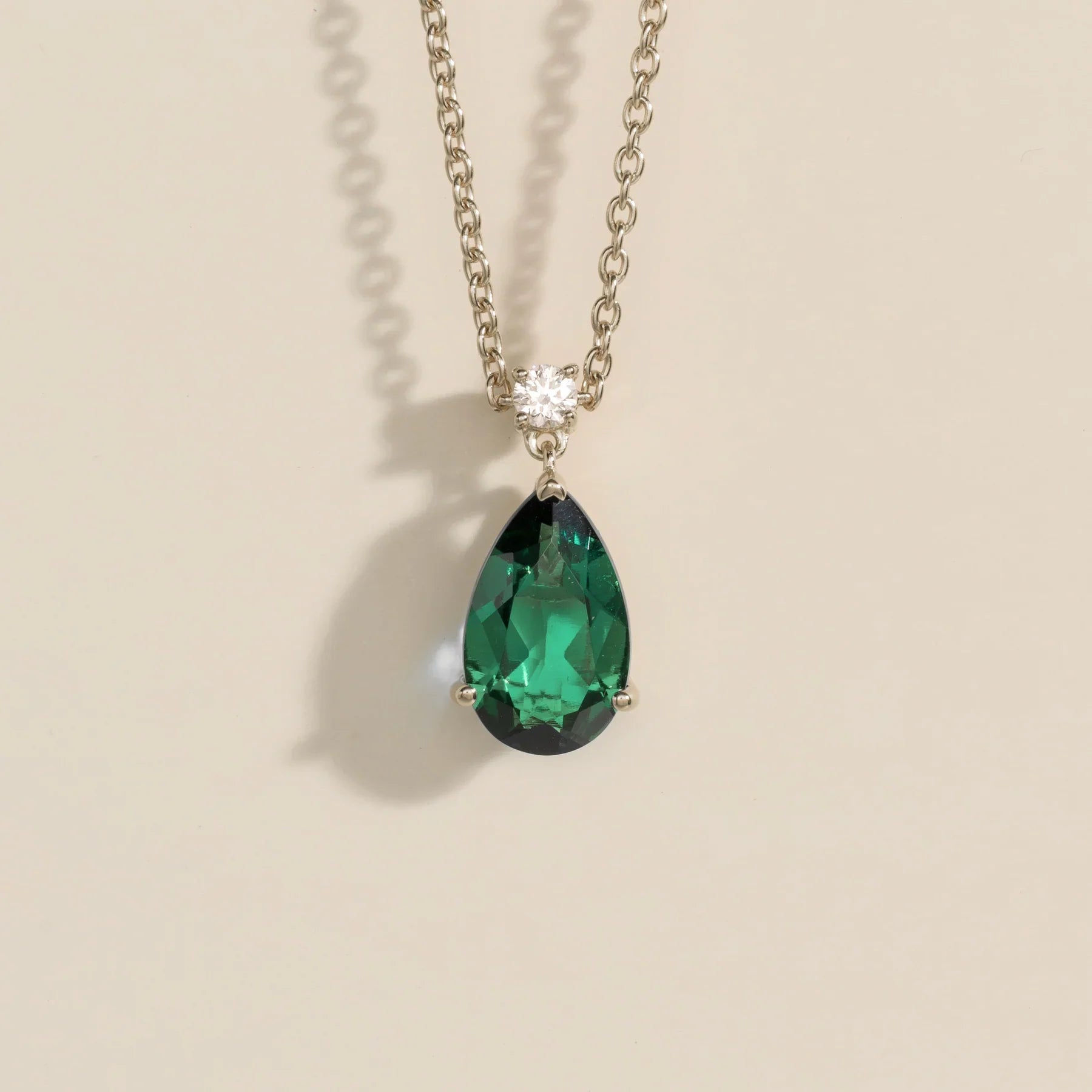 Pear-drop lab-grown emerald and diamond pendant necklace, Pisa large design in white gold | Juvetti London