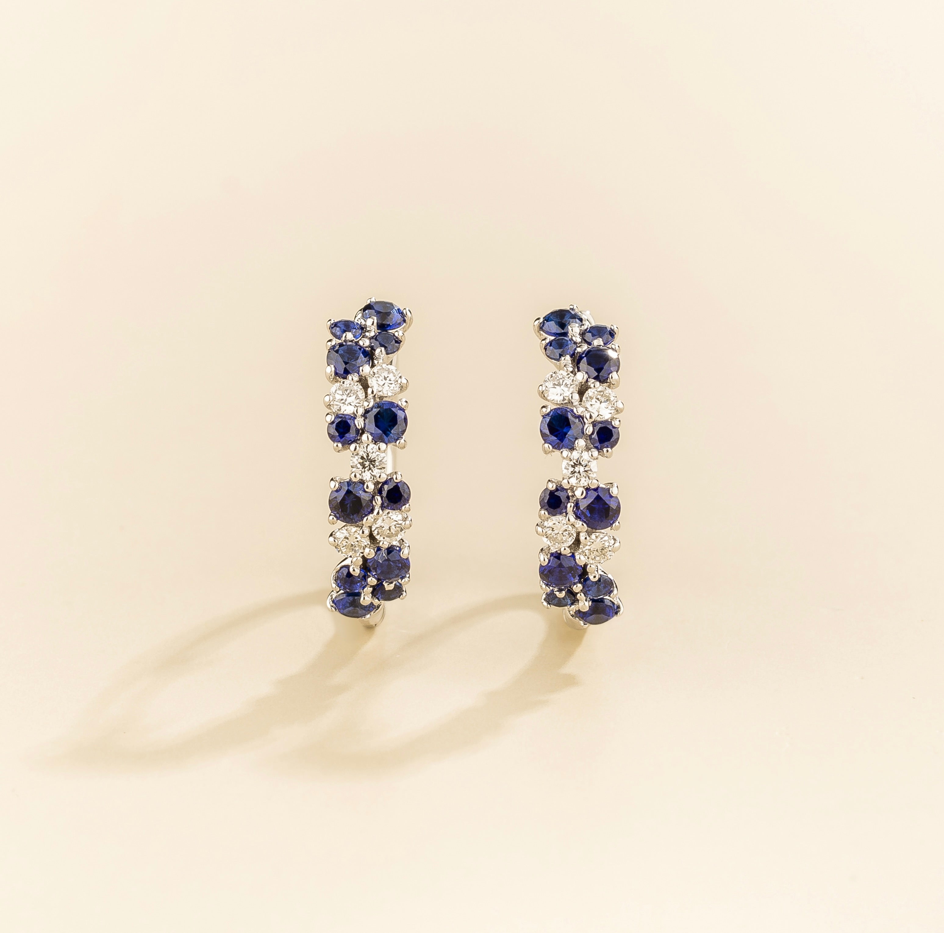 Starry Blue Sapphire & Diamond Cluster Huggie Hoop Earrings in White Gold