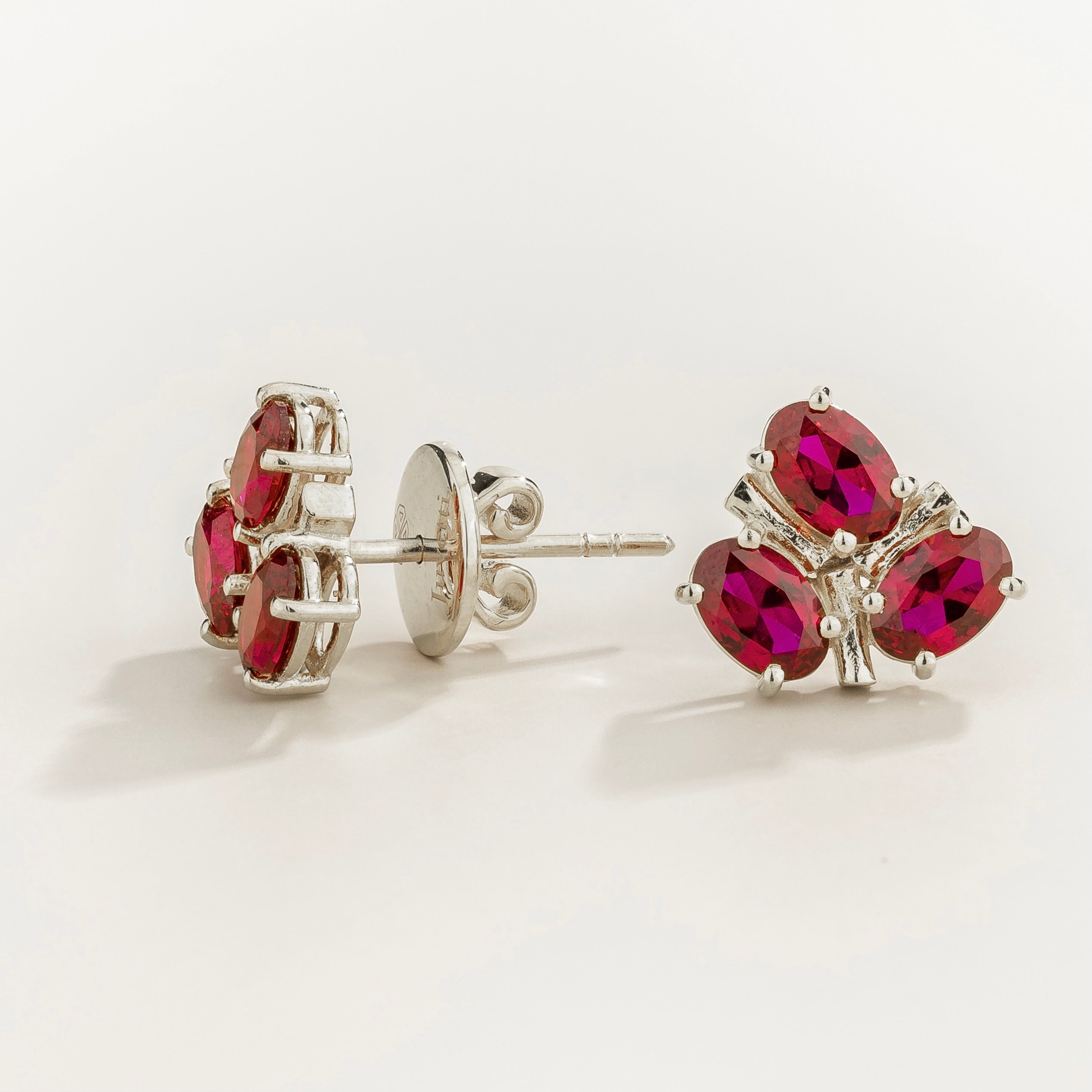 Ligna Oval Ruby Cluster Stud Earrings in White Gold