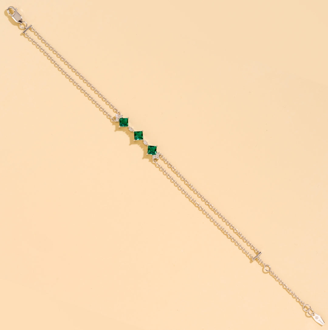Forma White Gold Bracelet In Emerald and Diamond By Bespoke Jewellery London UK