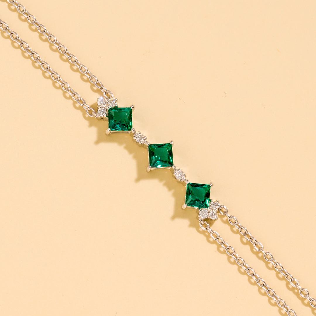 Forma White Gold Bracelet In Emerald and Diamond By Bespoke Jewellery London