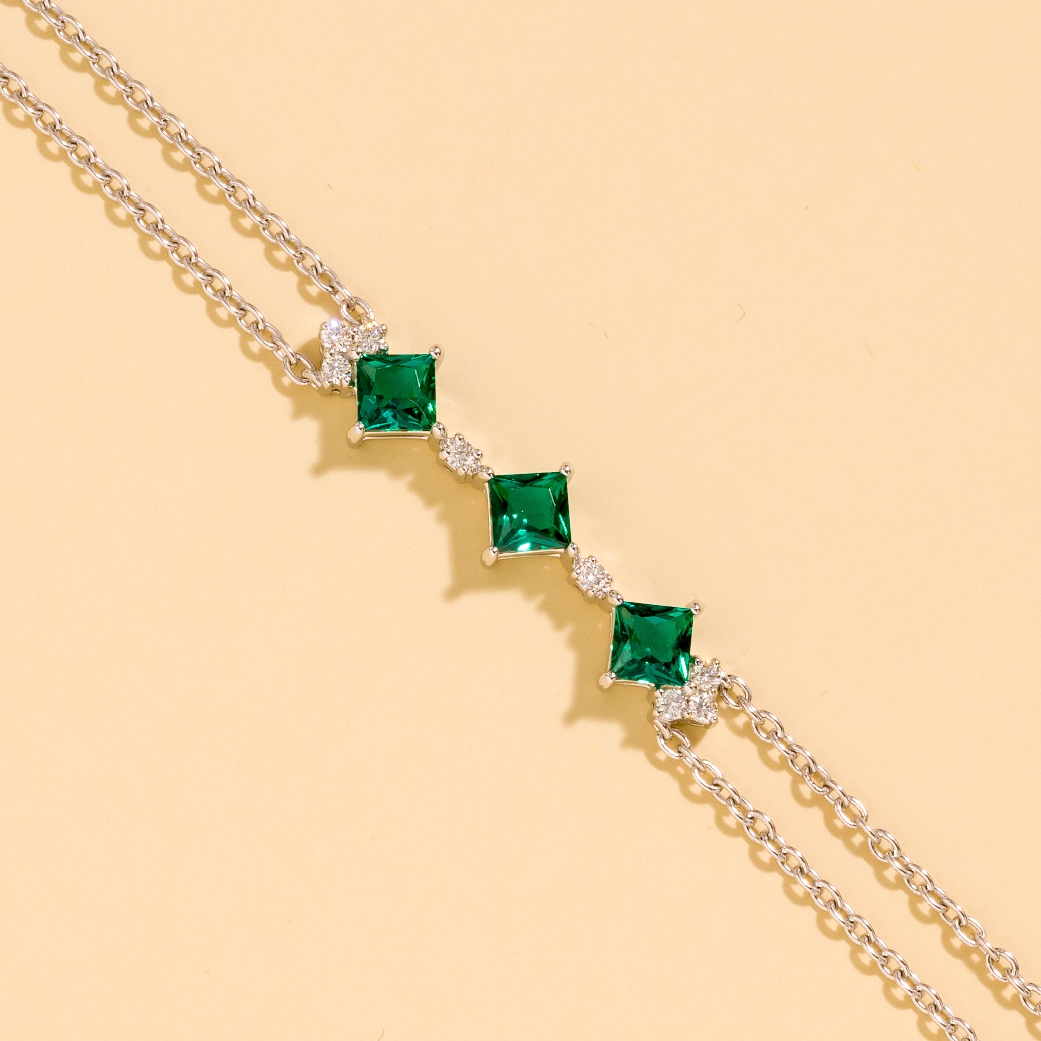 Forma White Gold Bracelet In Emerald and Diamond By Bespoke Jewellery London