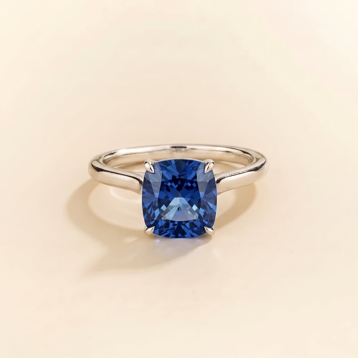 Iris Cushion Shape Blue Sapphire  Cathedral Solitaire Ring front