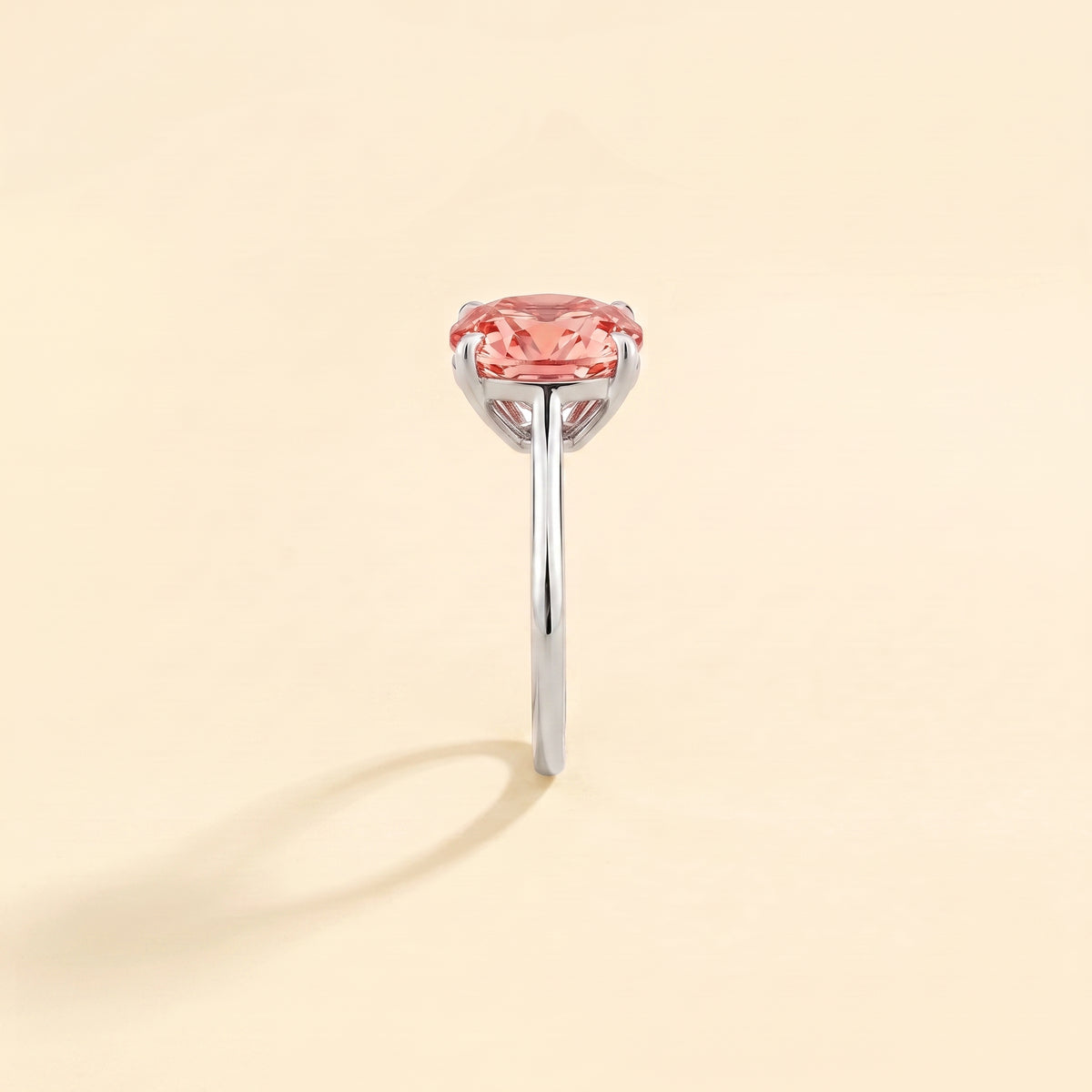 Iris Cushion Shape Padparadscha Sapphire Cathedral Solitaire Ring side edge