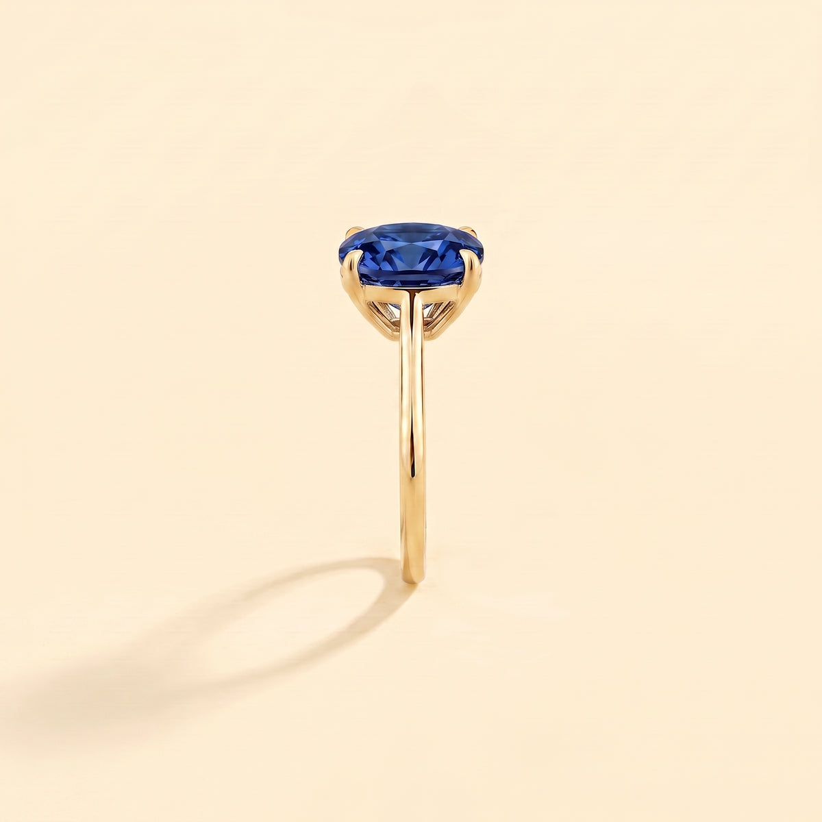 Iris Cushion Shape Blue Sapphire Cathedral Solitaire Ring side edge