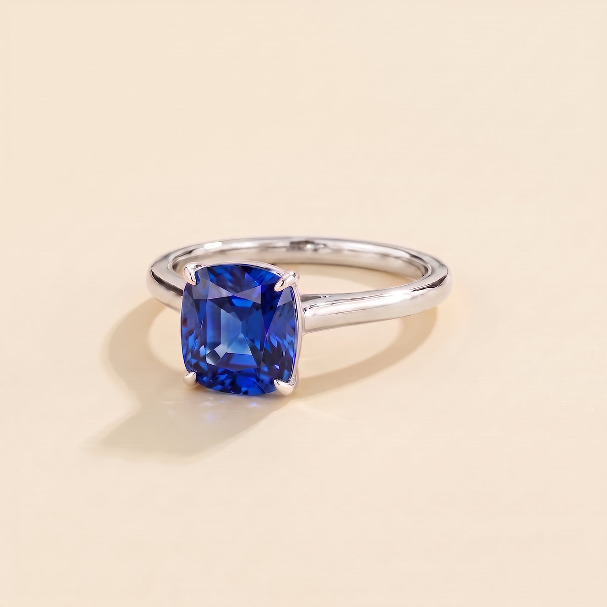 Iris Cushion Shape Blue Sapphire Cathedral Solitaire Ring three quarter