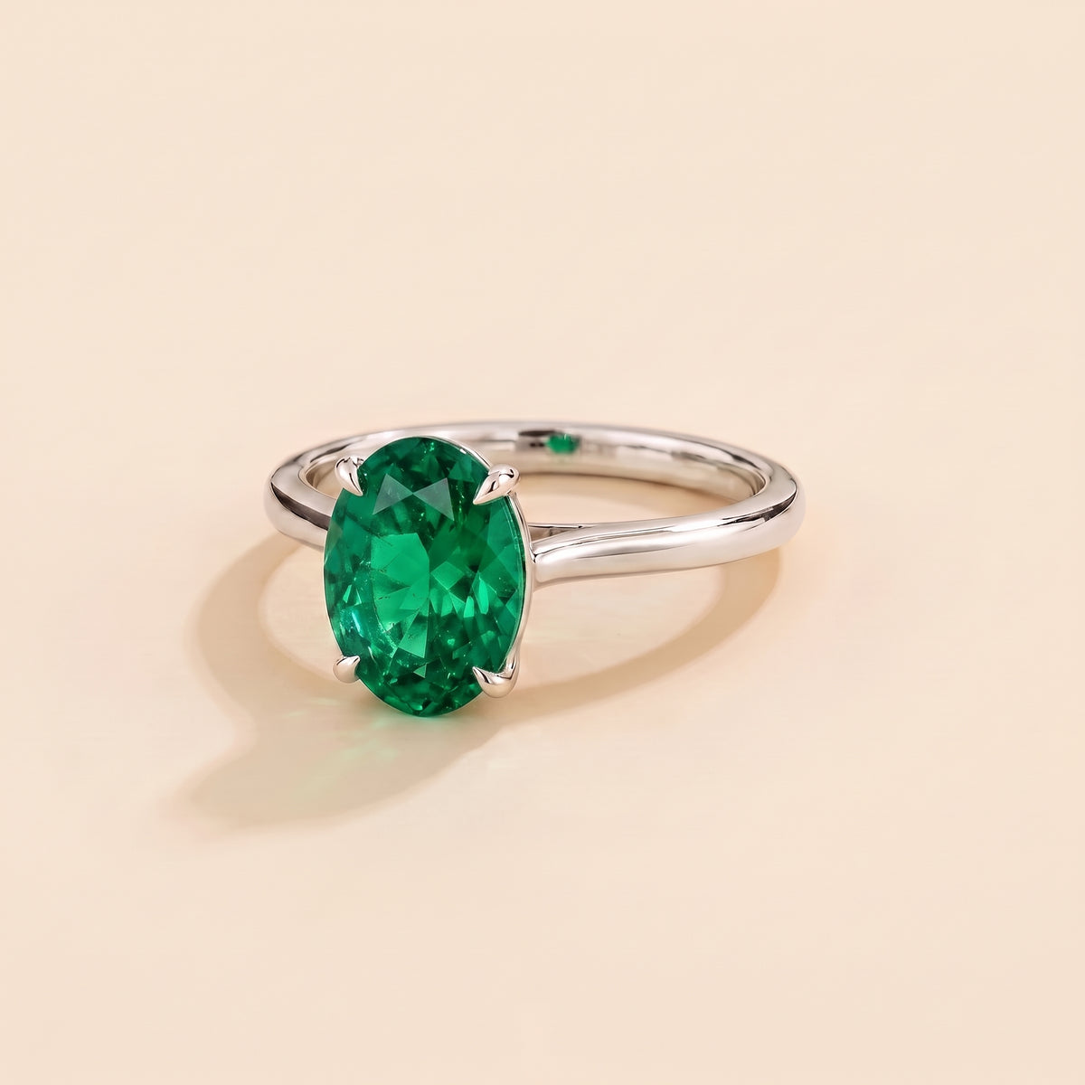 Lyra Oval Shape Emerald Cathedral Solitaire Ring three quarter